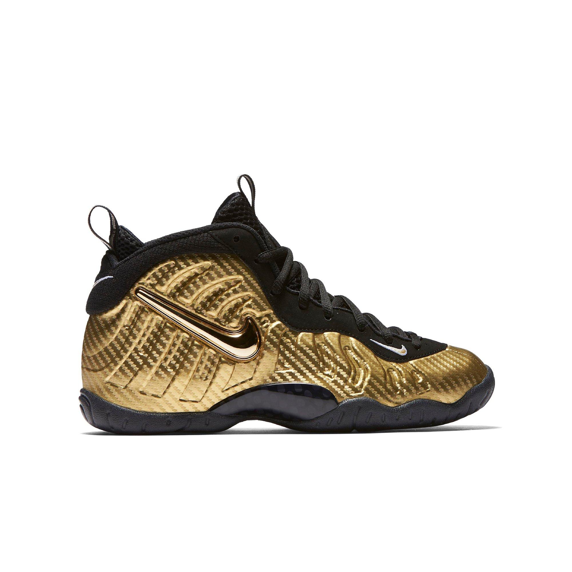 nike little posite one black and gold