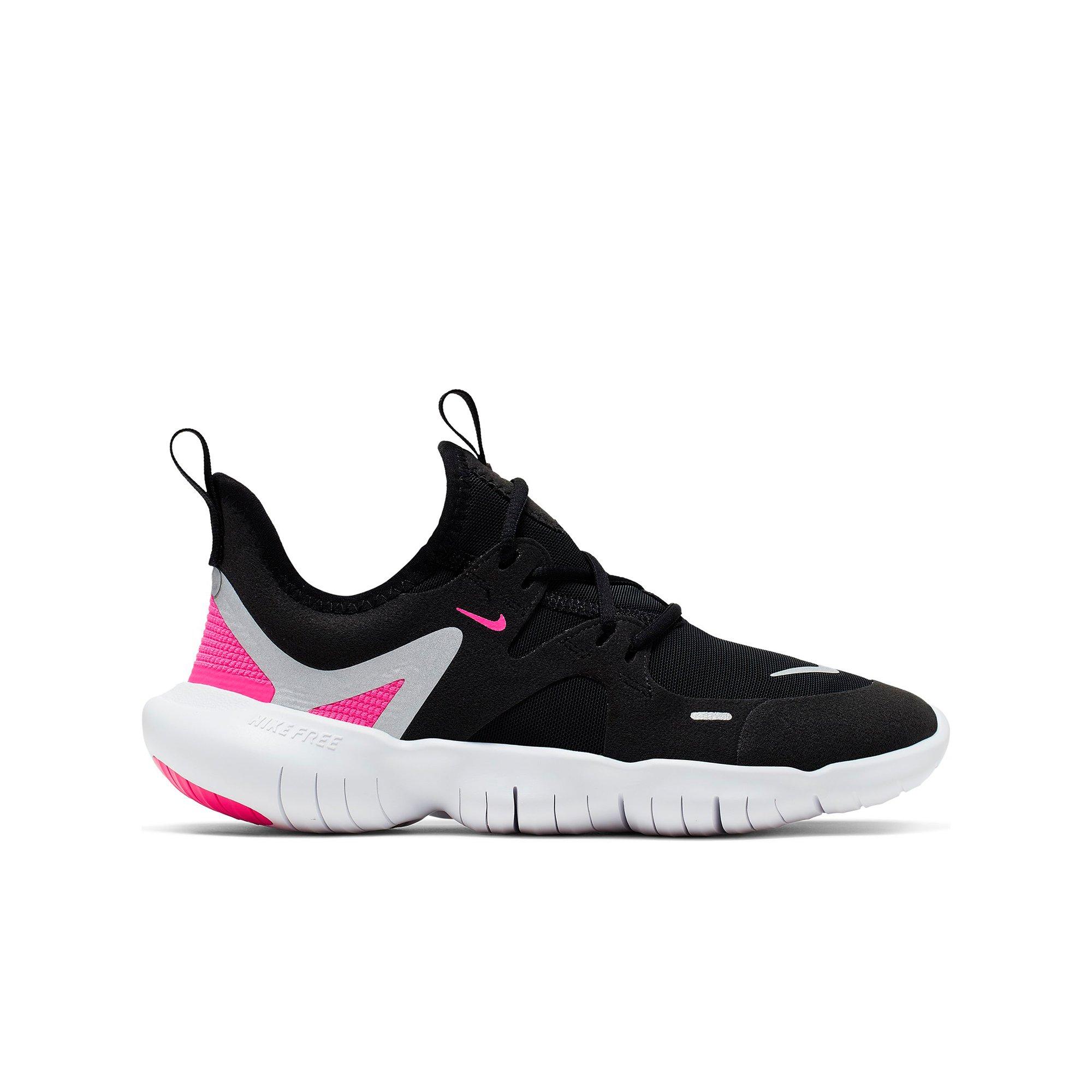 black and pink nike free runs