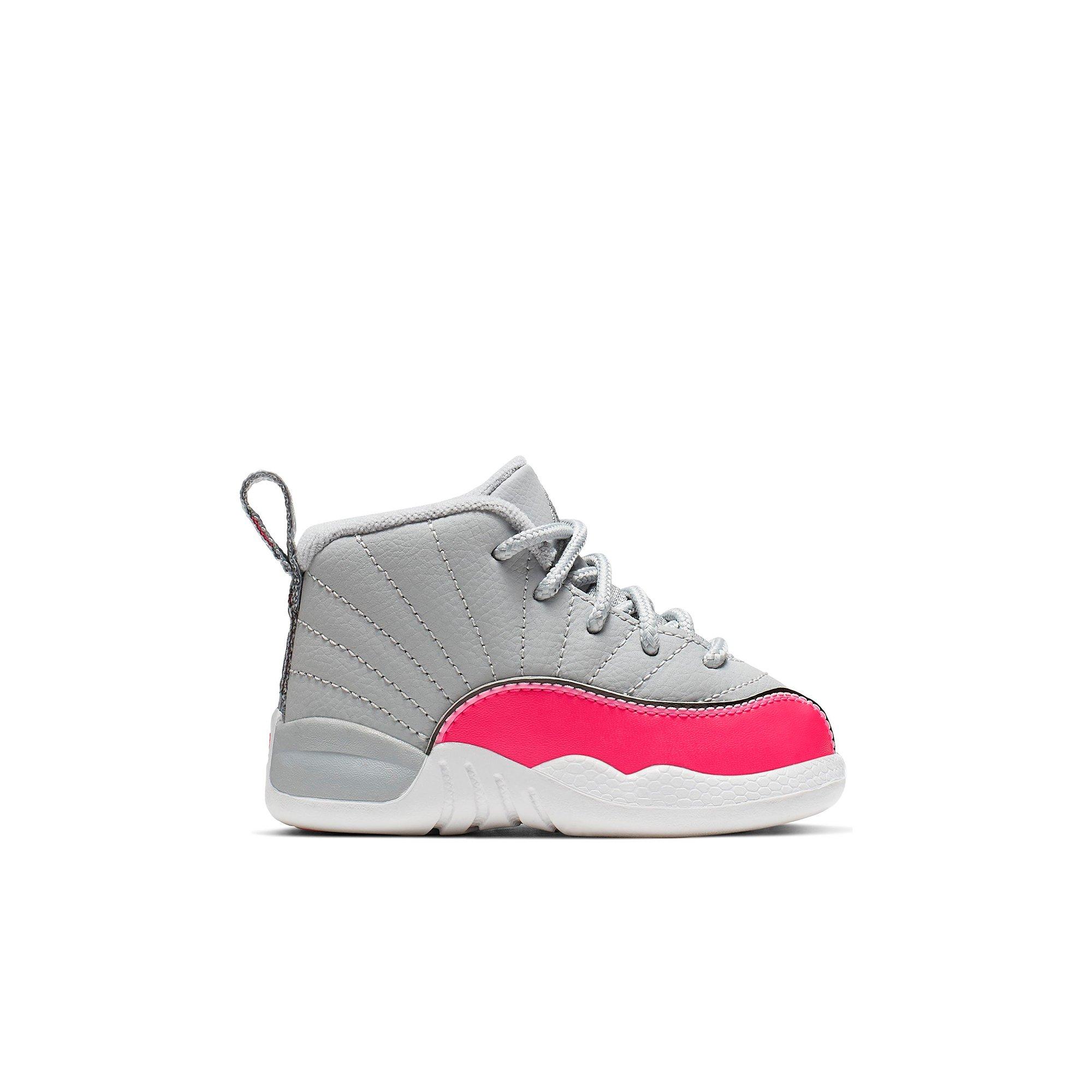pink and white baby jordans