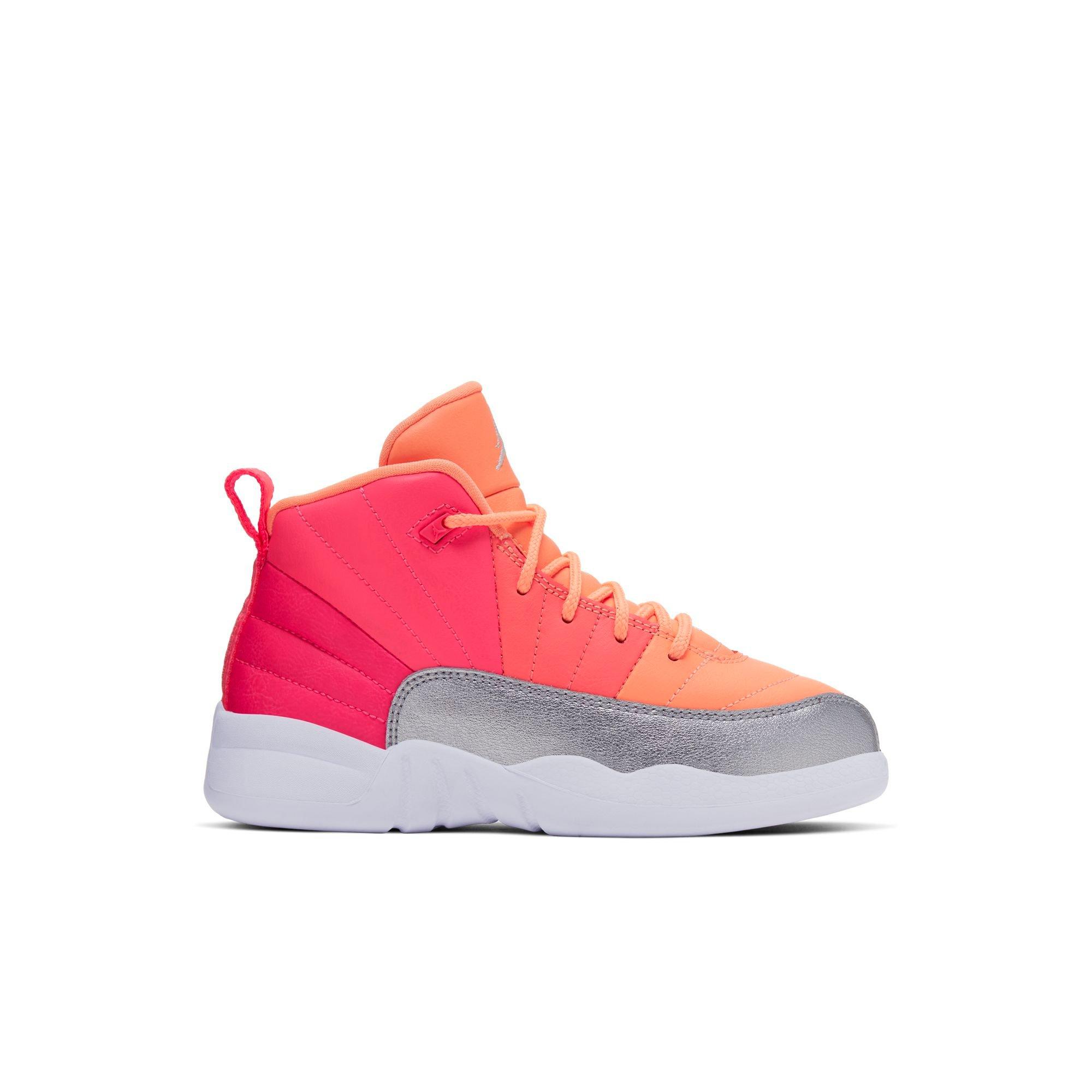 orange and white jordans 12