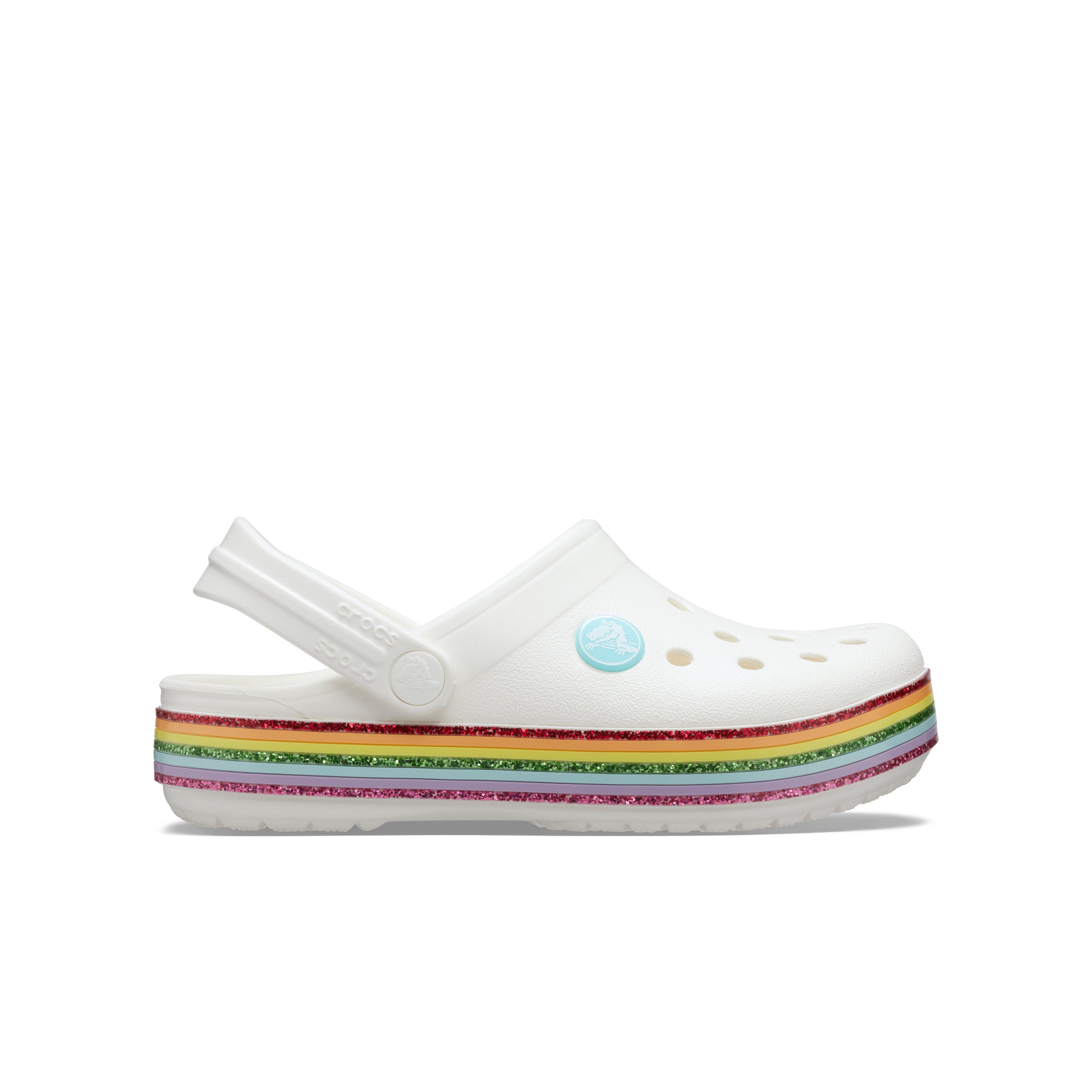 white and rainbow crocs