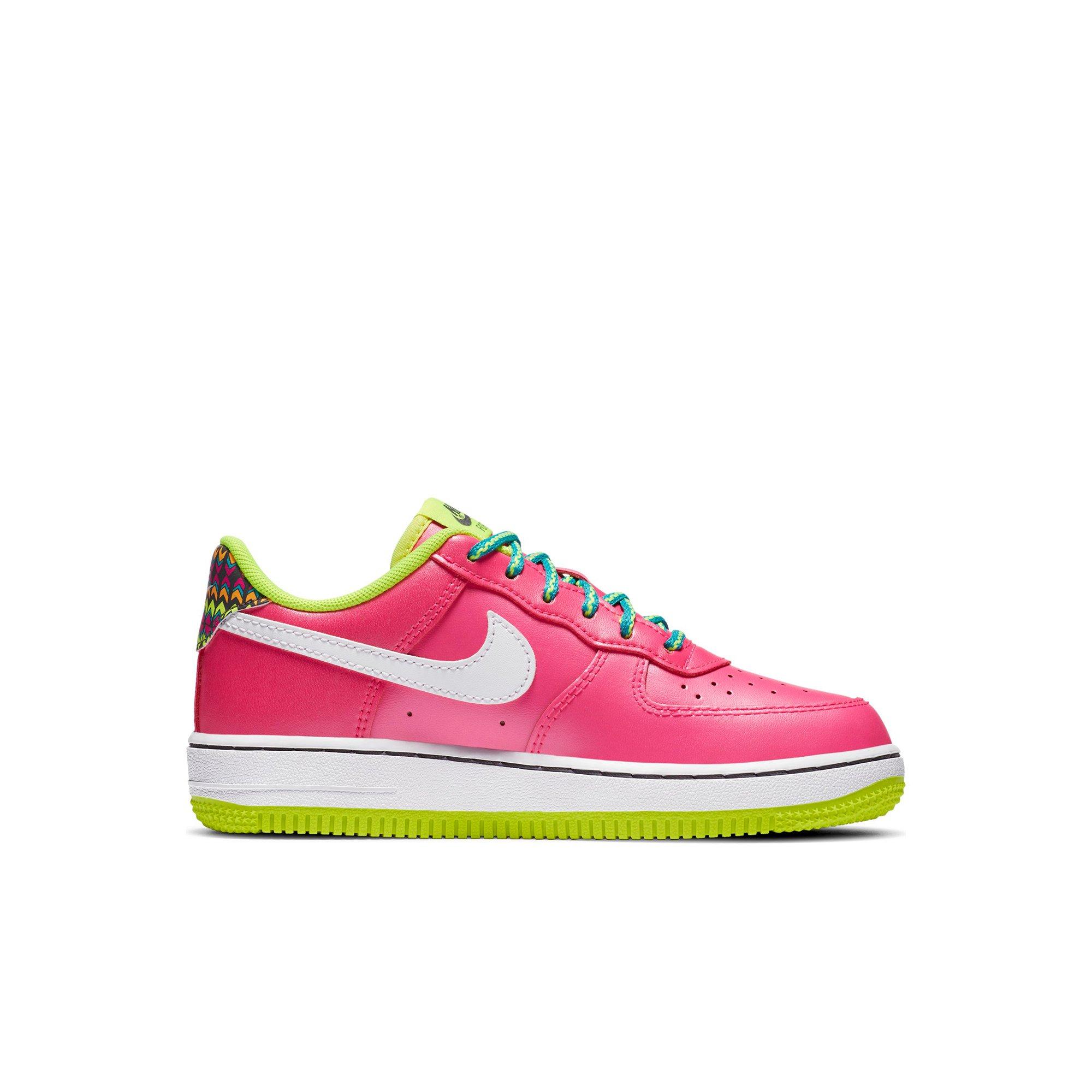 pink and yellow nike shoes