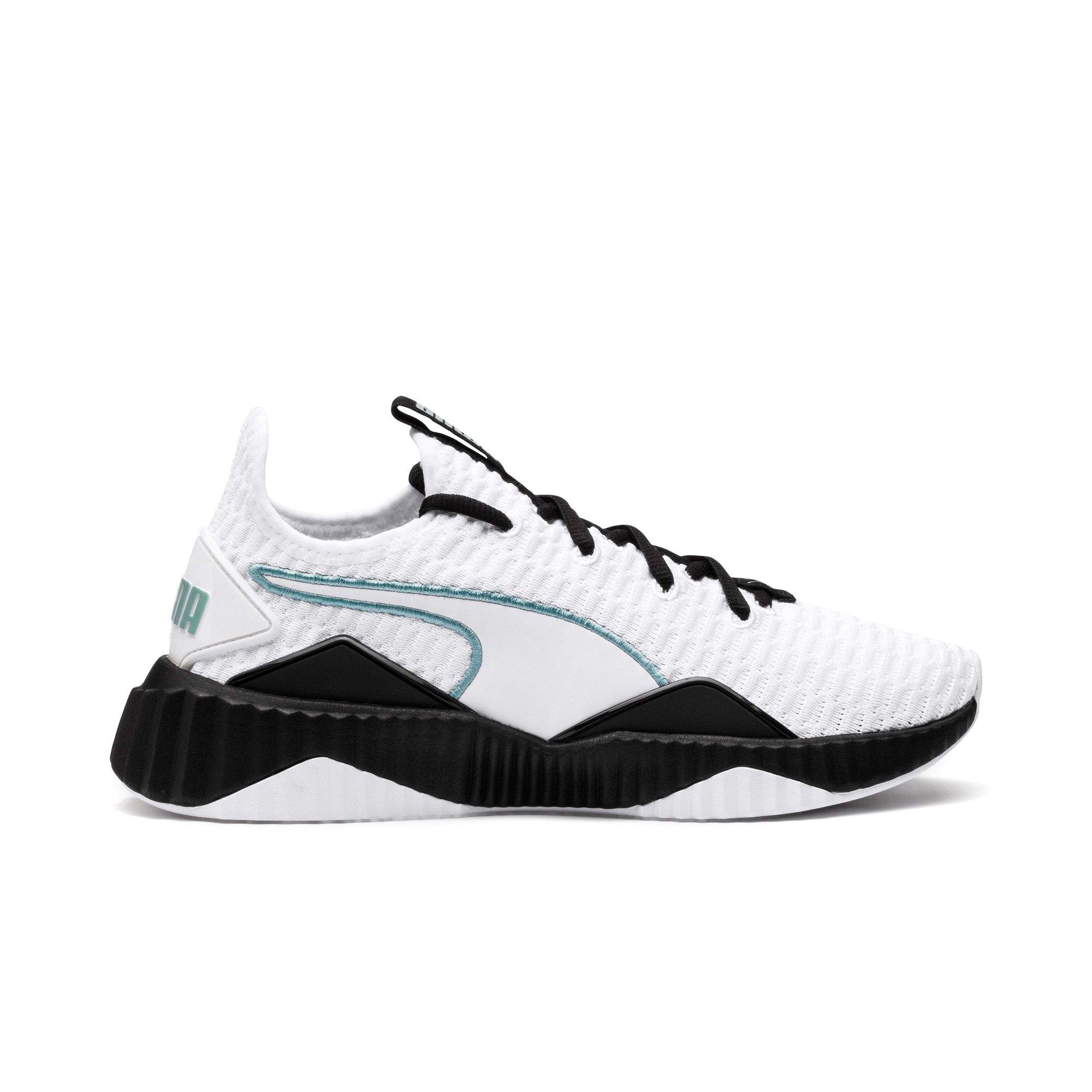 puma defy trainers white