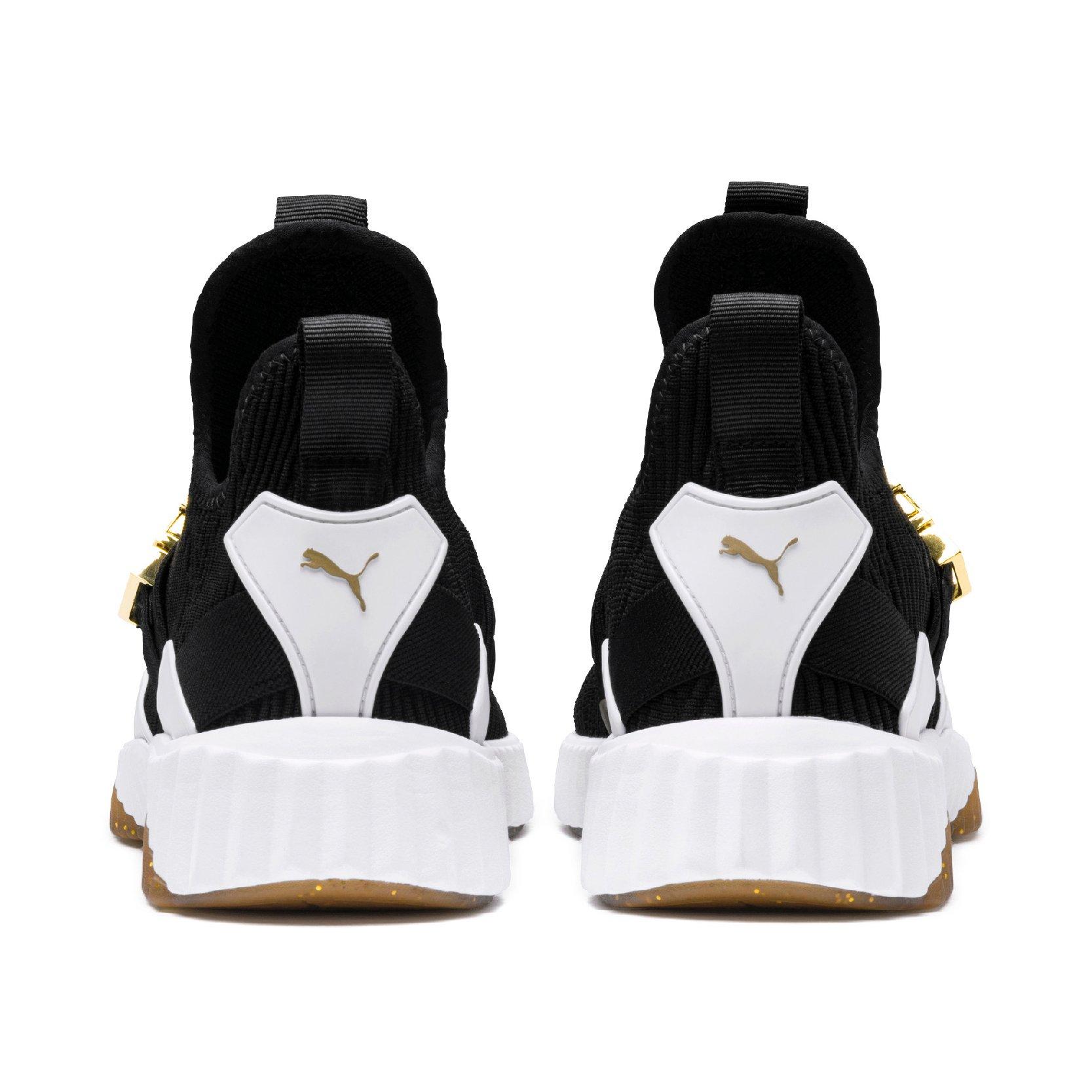 puma defy mid varsity white