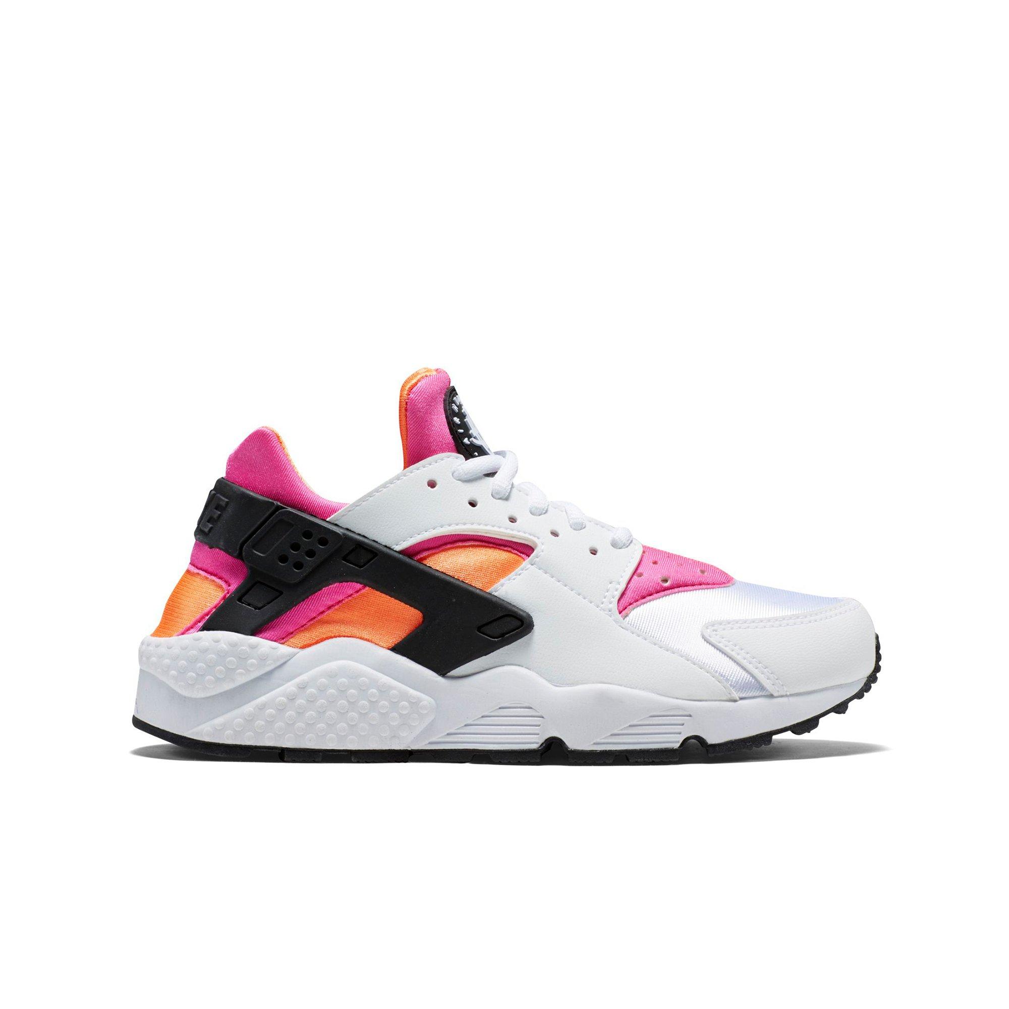 pink and orange tennis shoes