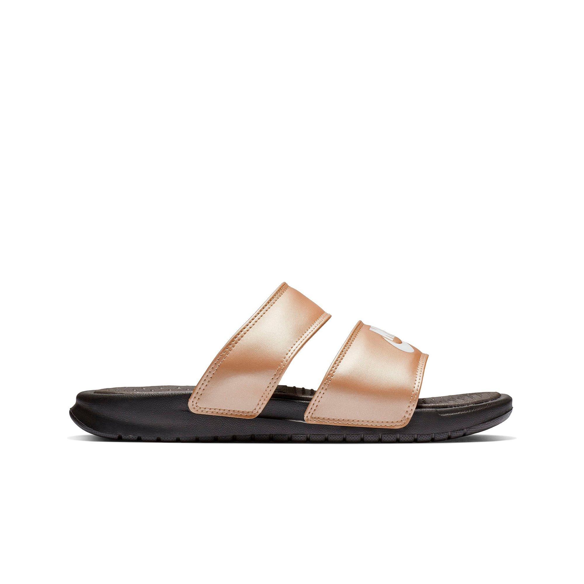 bronze nike slides