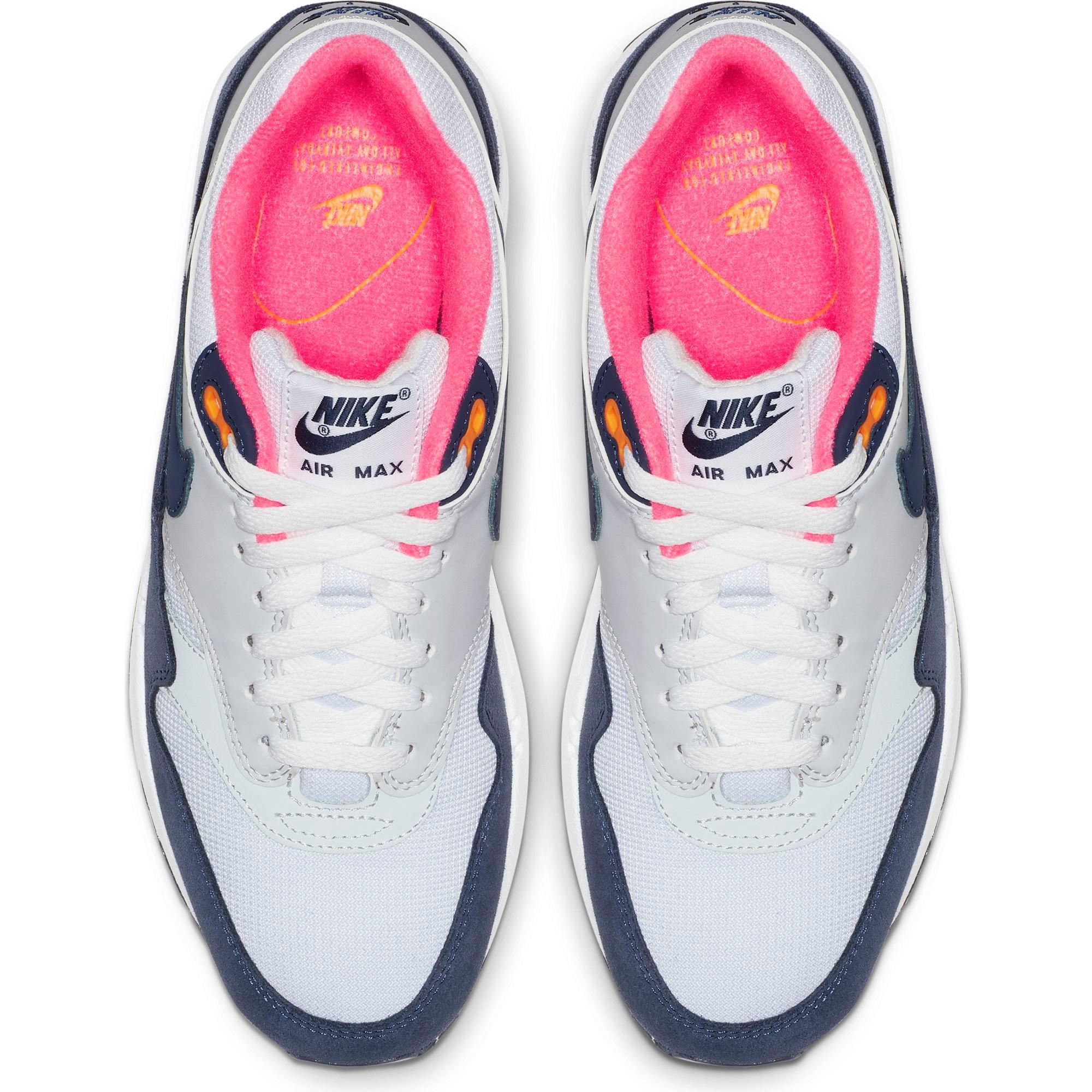 navy and pink nike shoes