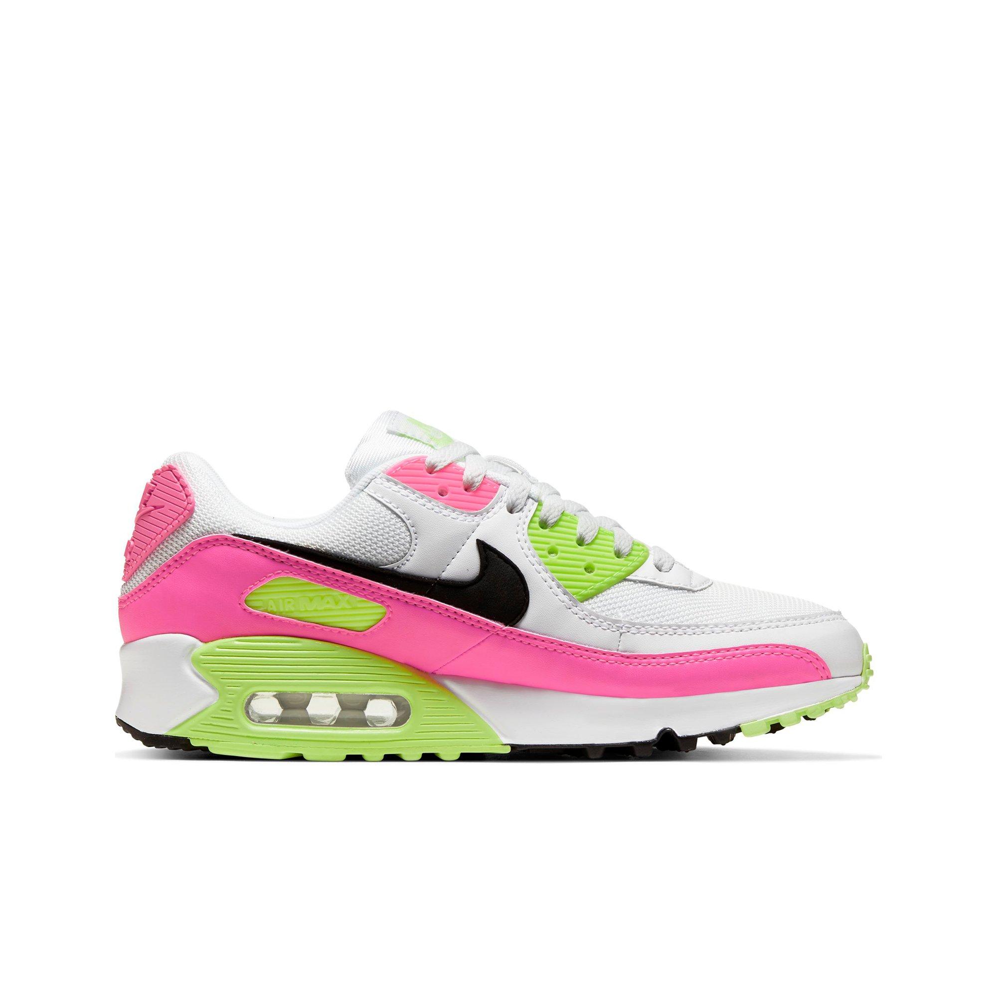 pink green nike shoes
