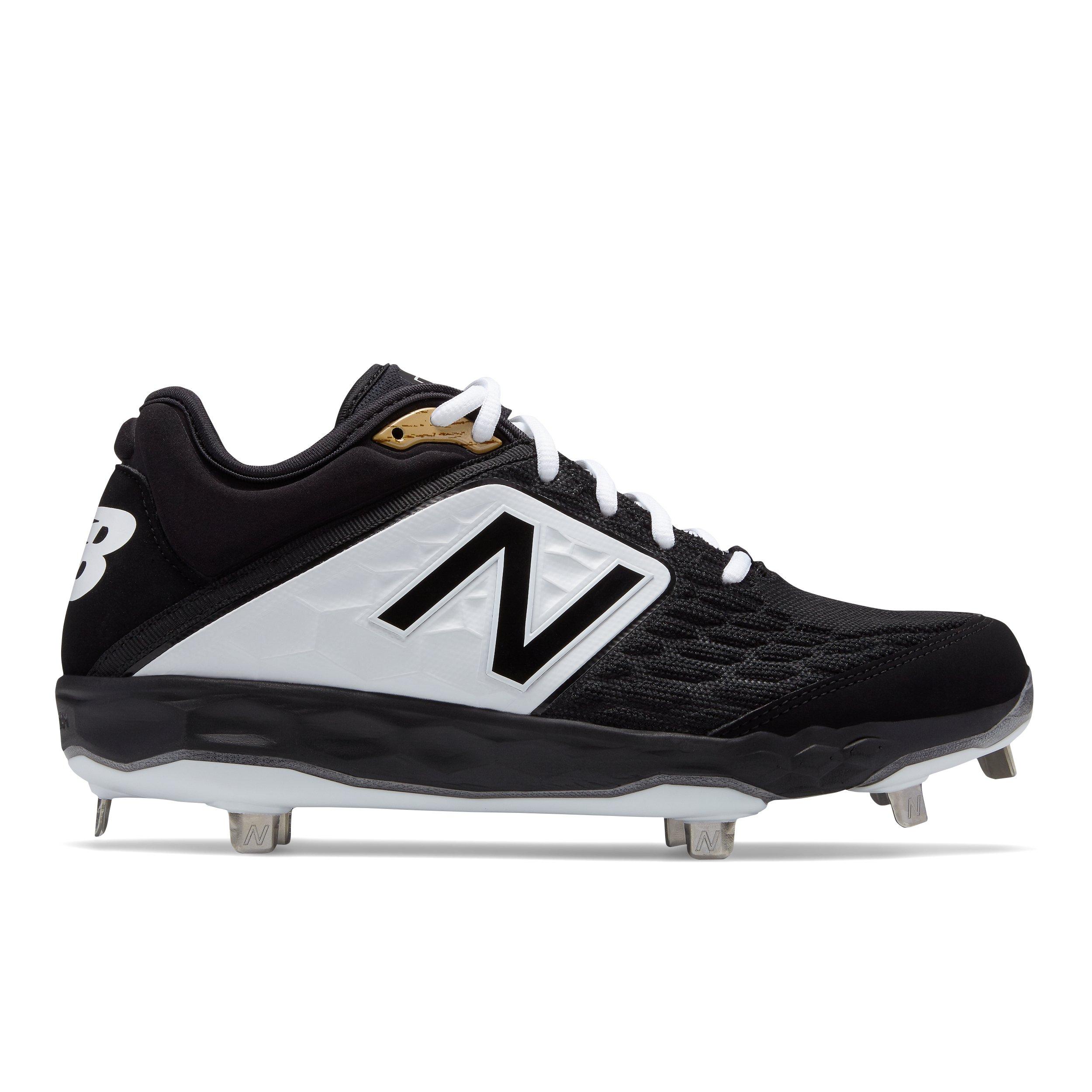 black and gold metal baseball cleats
