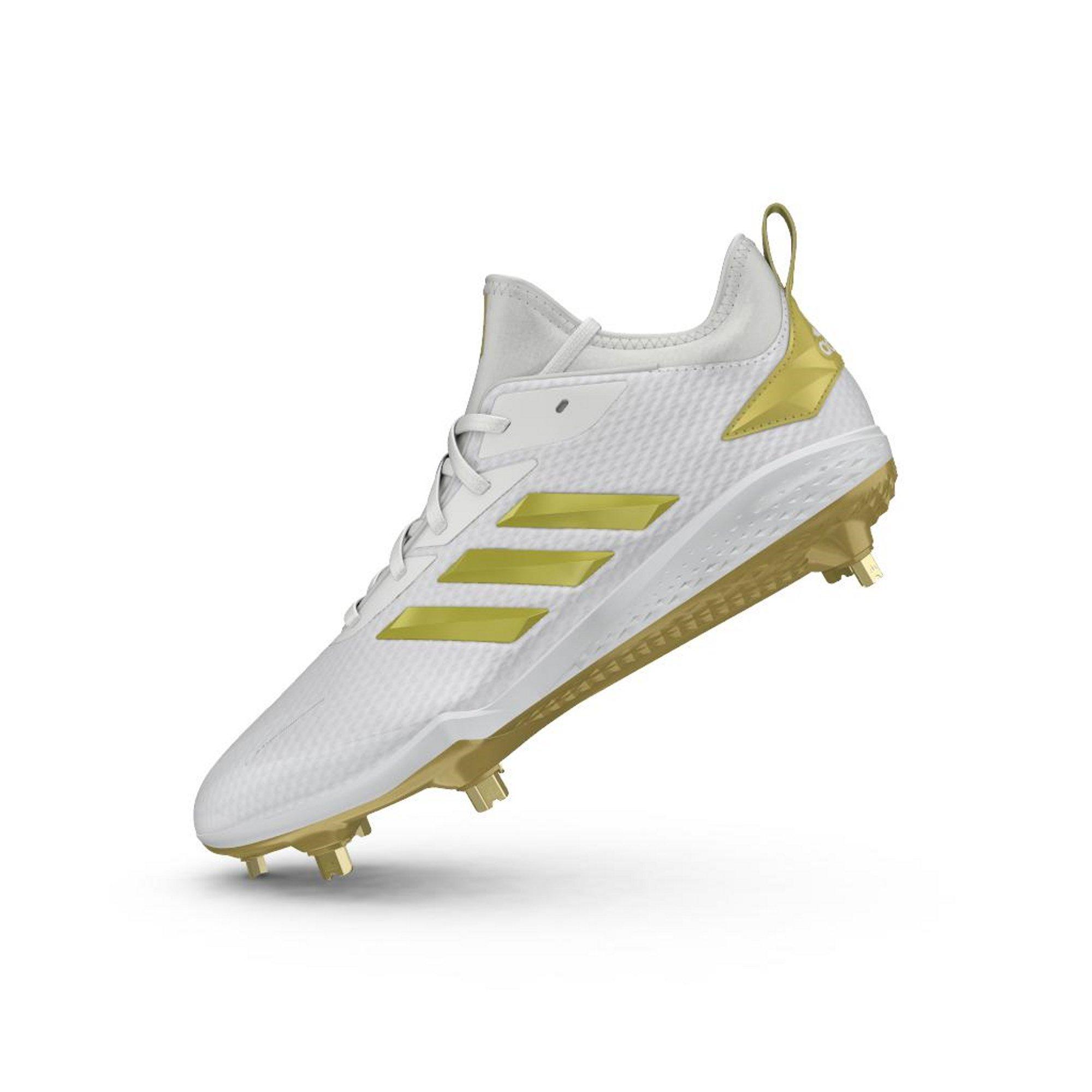 white and gold baseball cleats