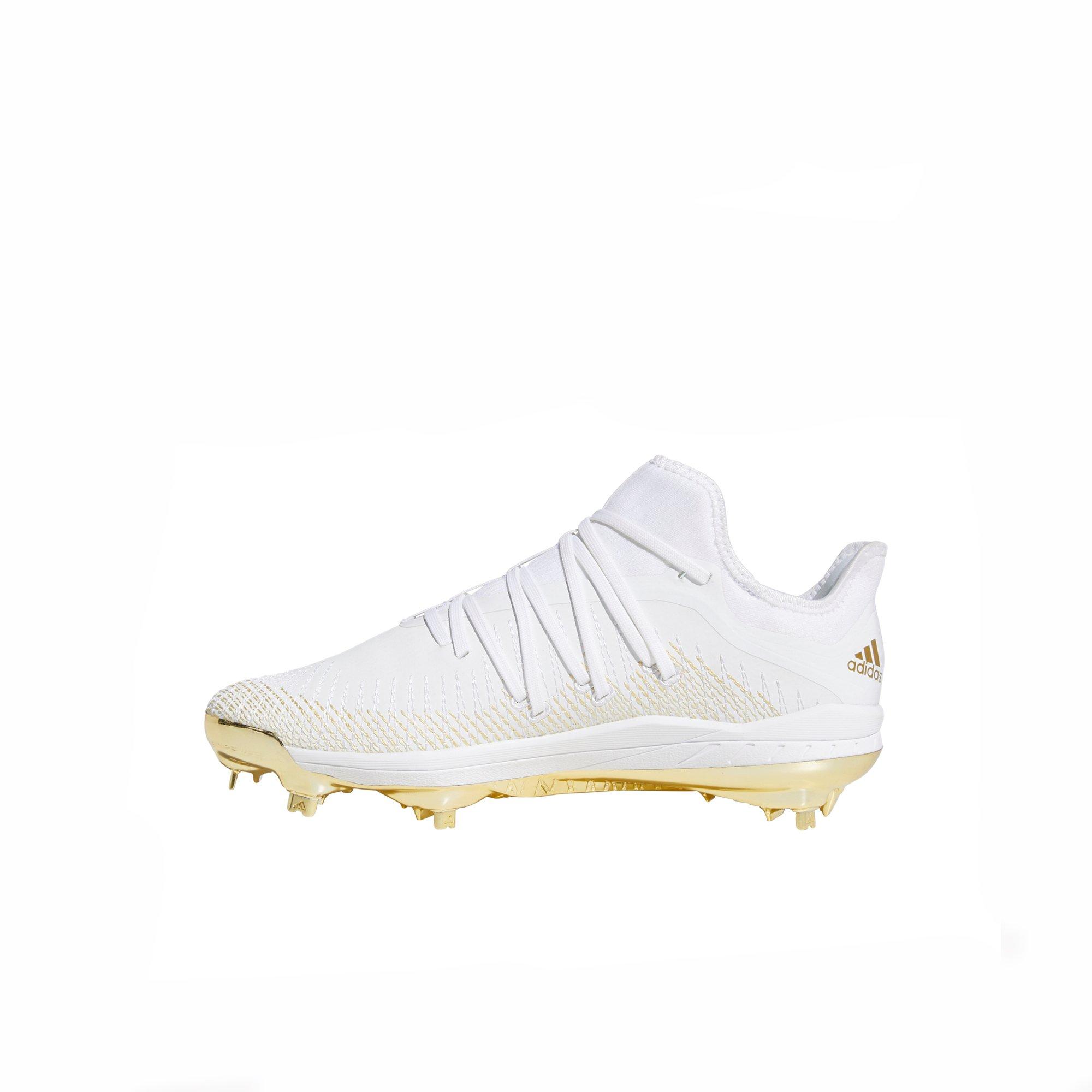 baseball cleats white and gold