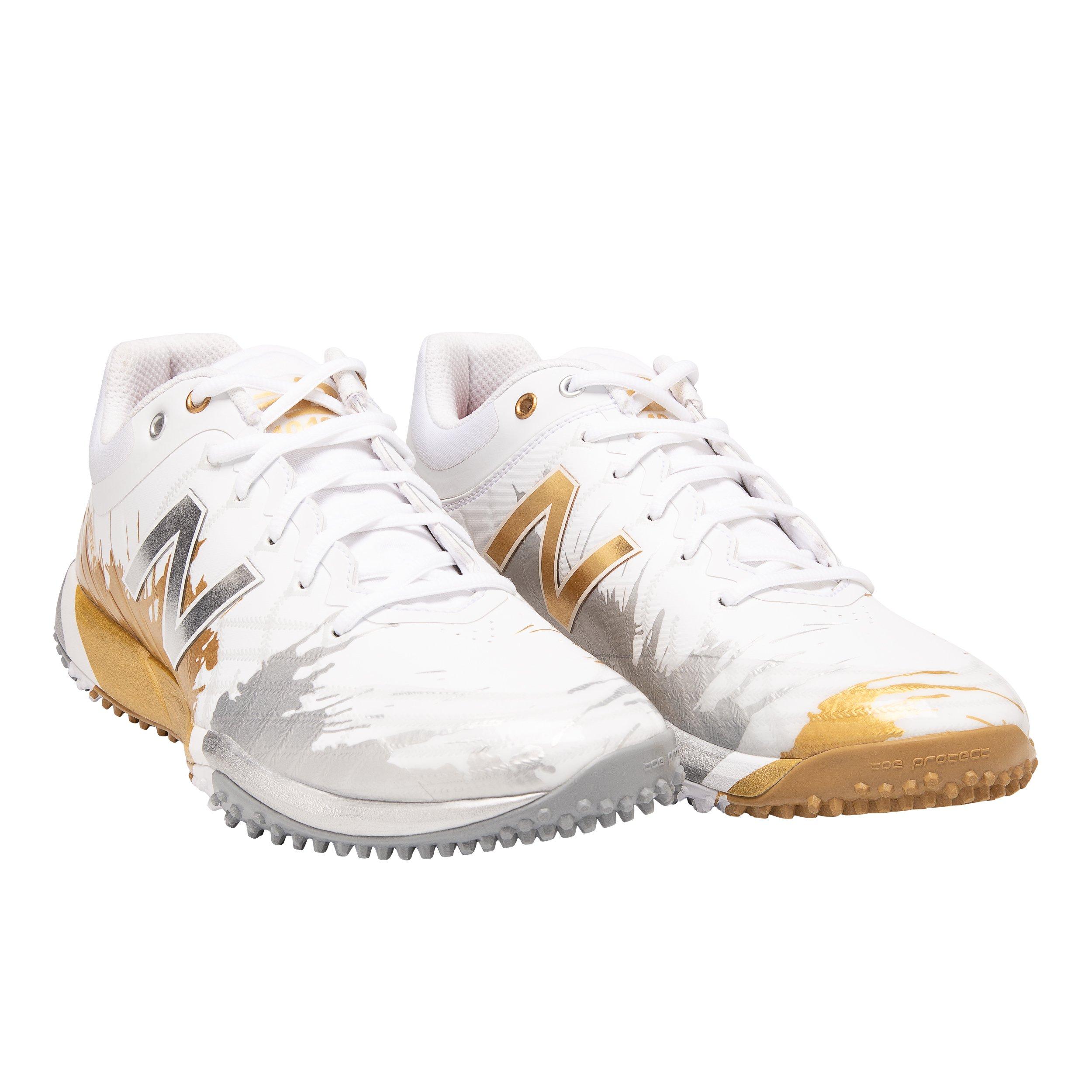 white and gold new balance baseball cleats