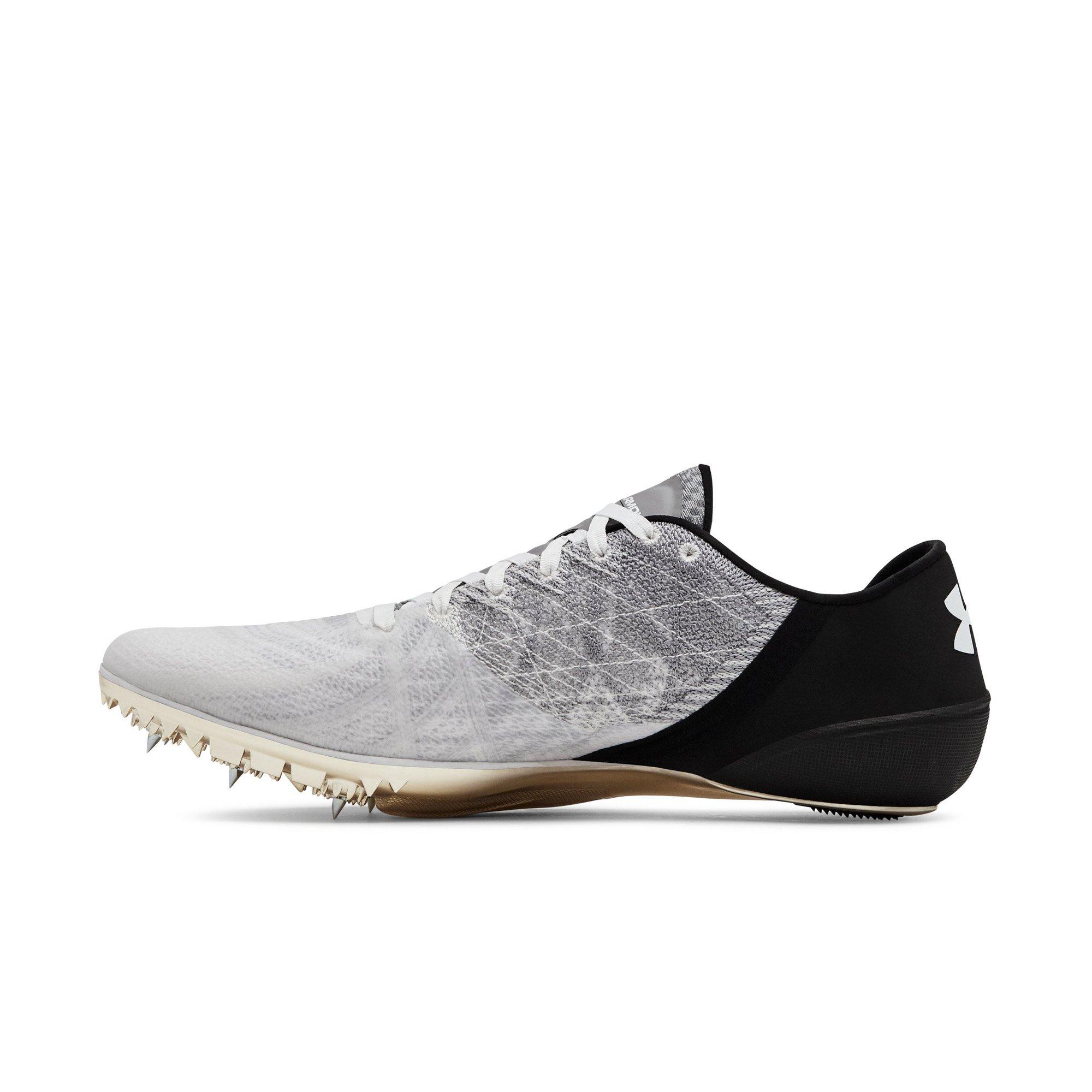 track spikes black and gold