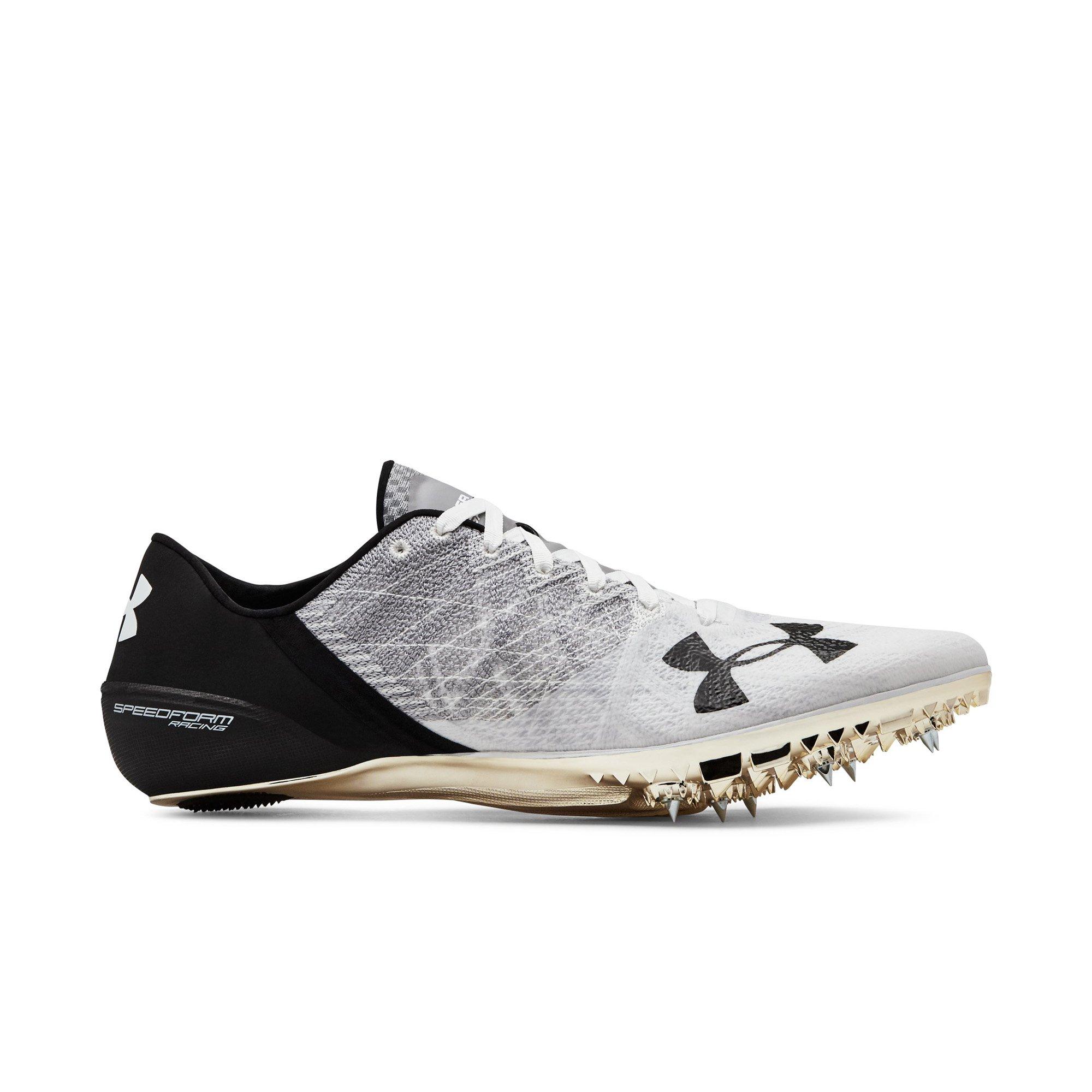 black and gold track spikes