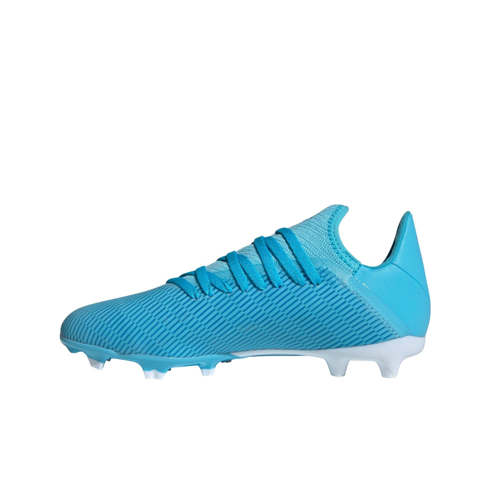 girls teal soccer cleats