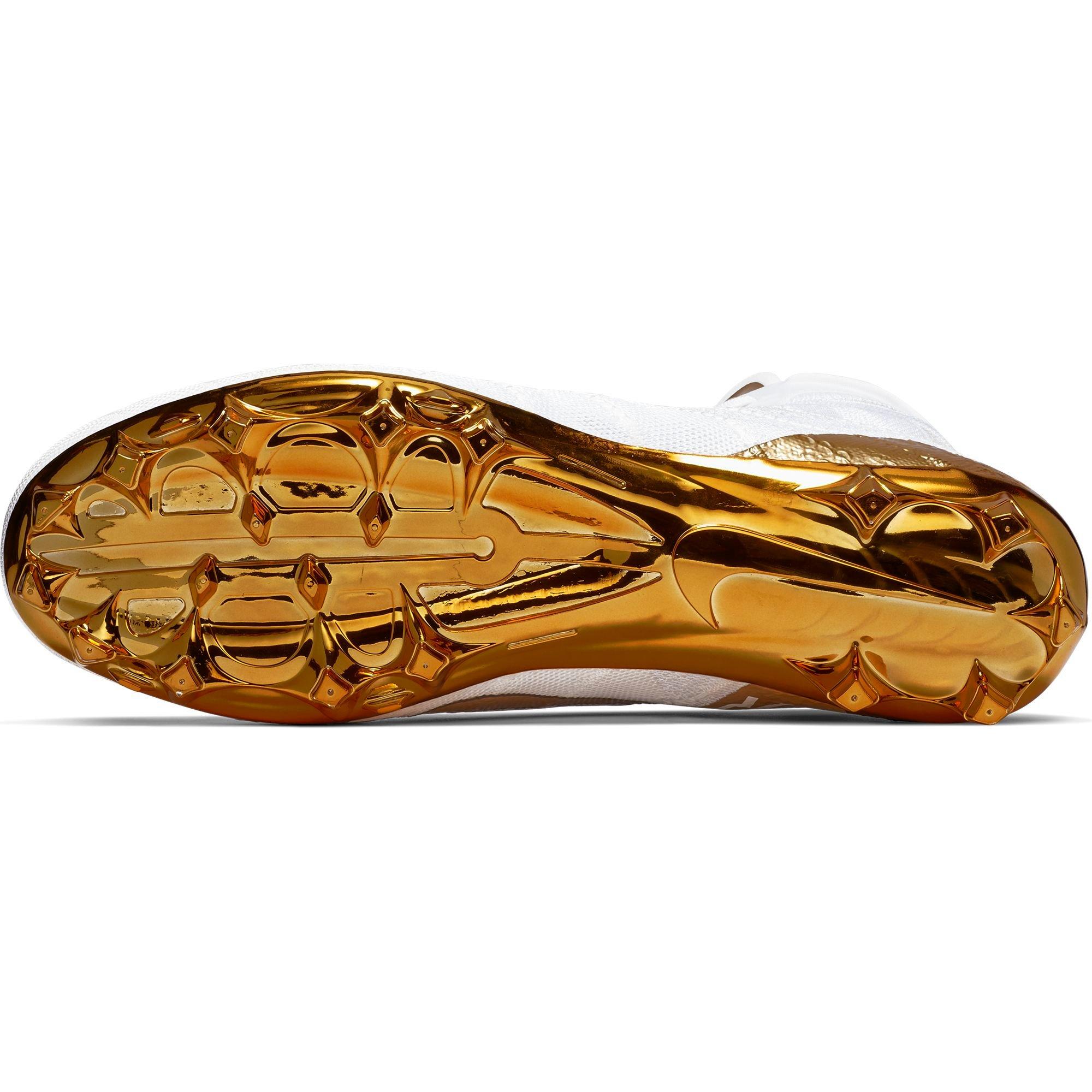 football cleats with gold bottoms