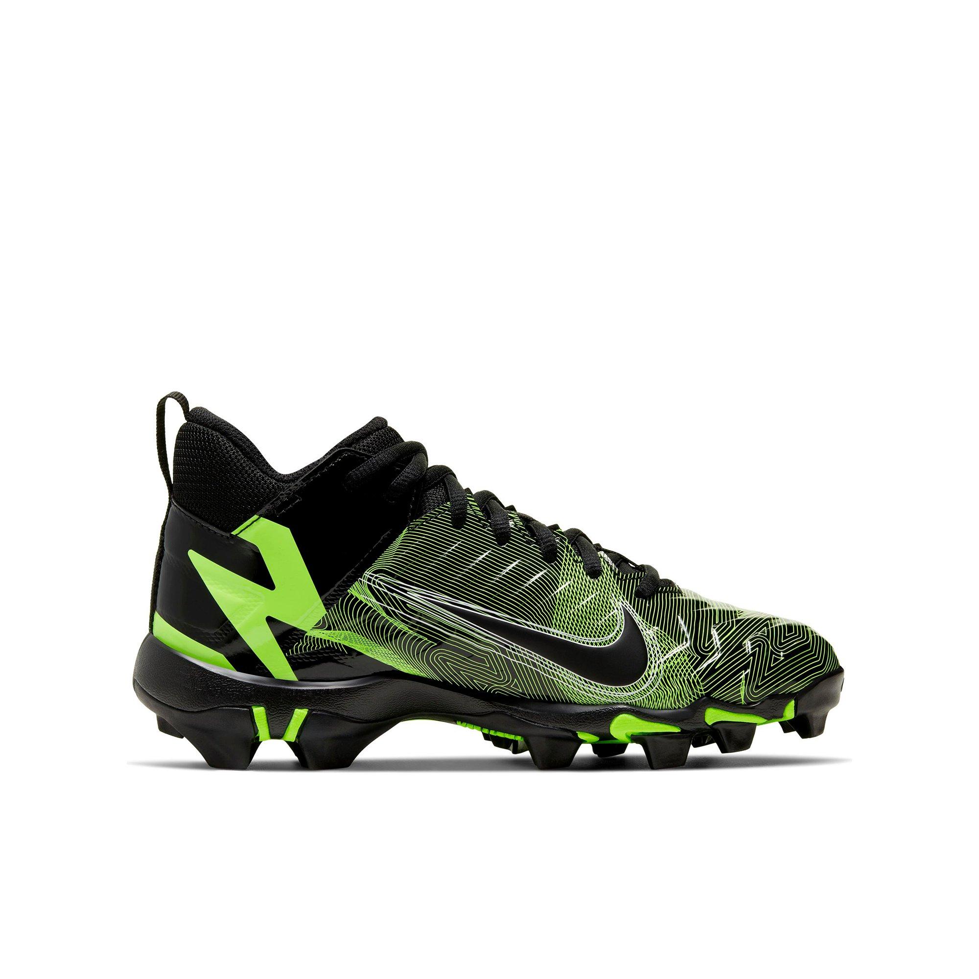 green and gold football cleats