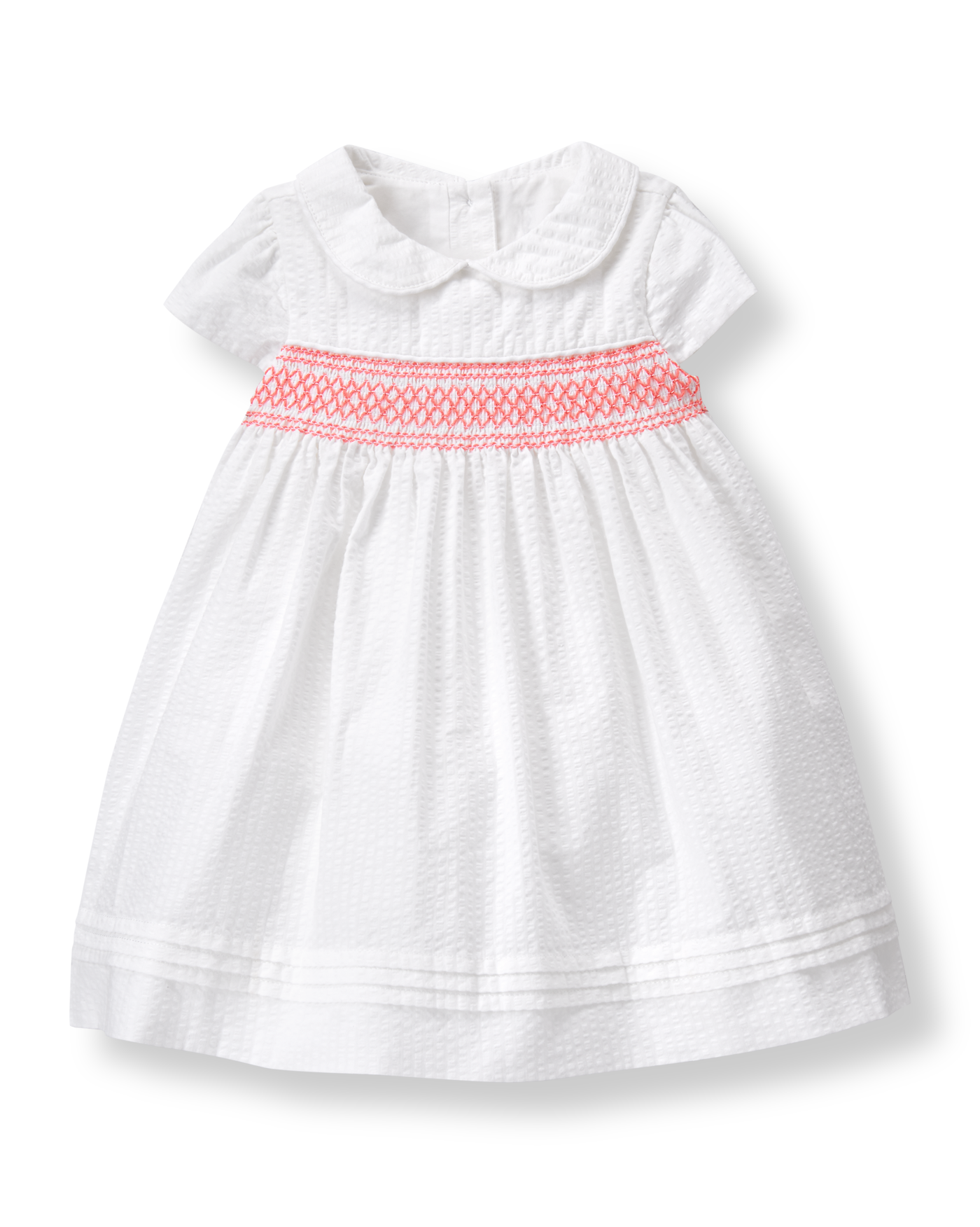 white smocked baby dress