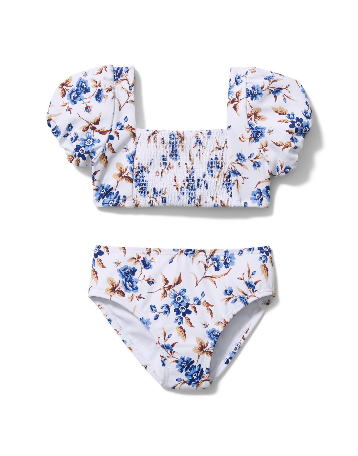 boy and girl matching swimwear, white and blue floral puff sleeve 2-piece