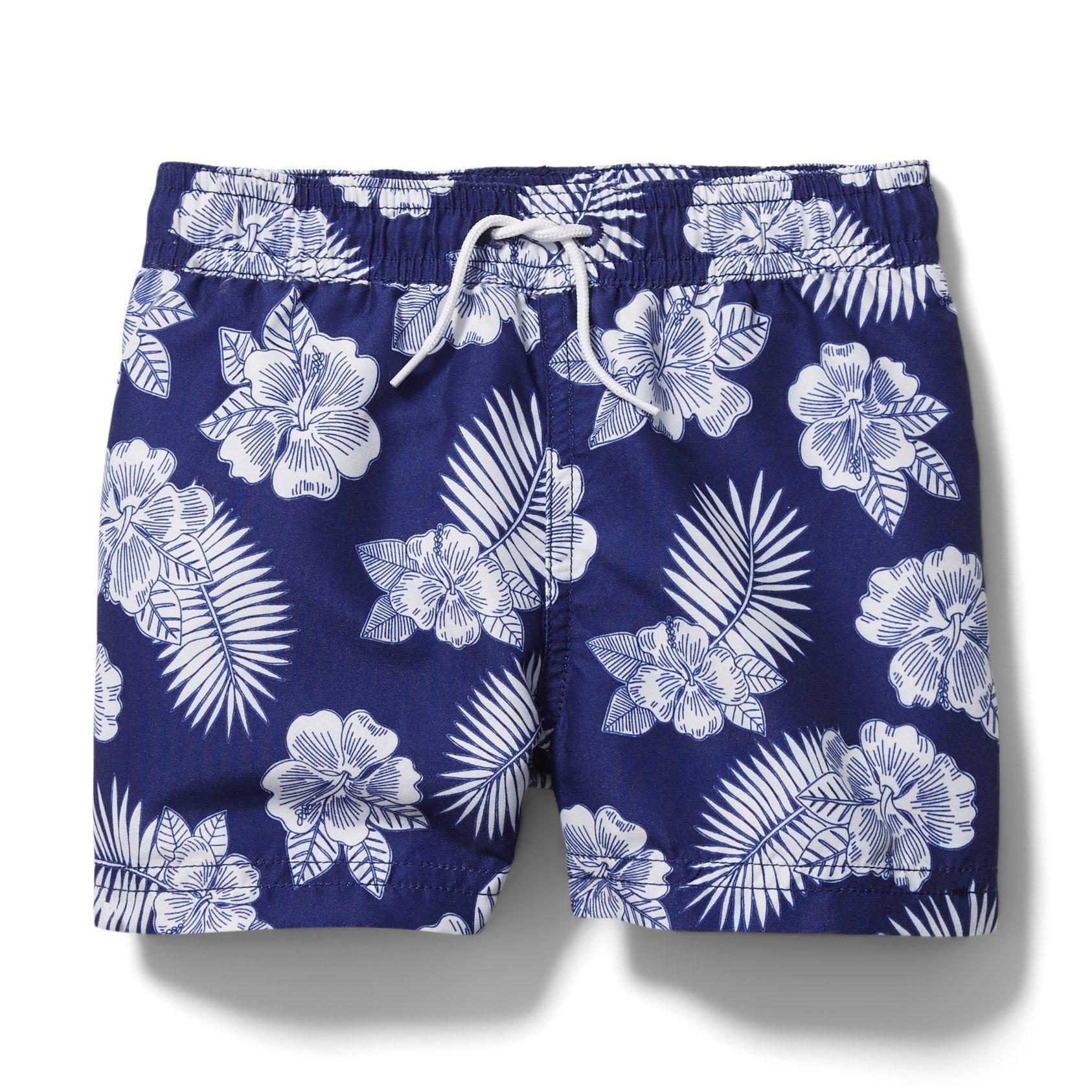 girl and boy matching swimwear, navy blue floral swim trunks