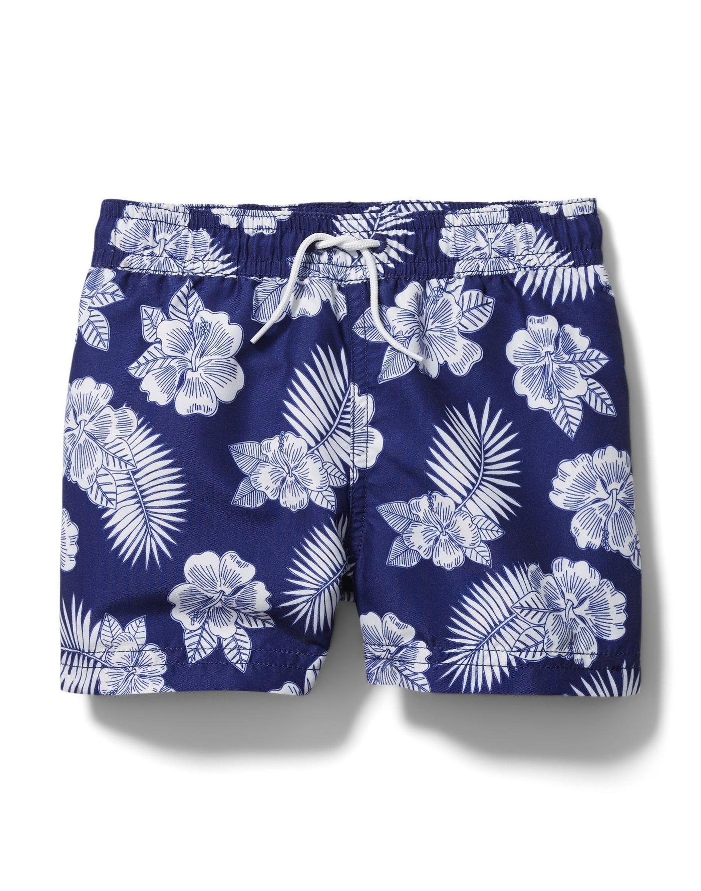 girl and boy matching swimwear, navy blue floral swim trunks