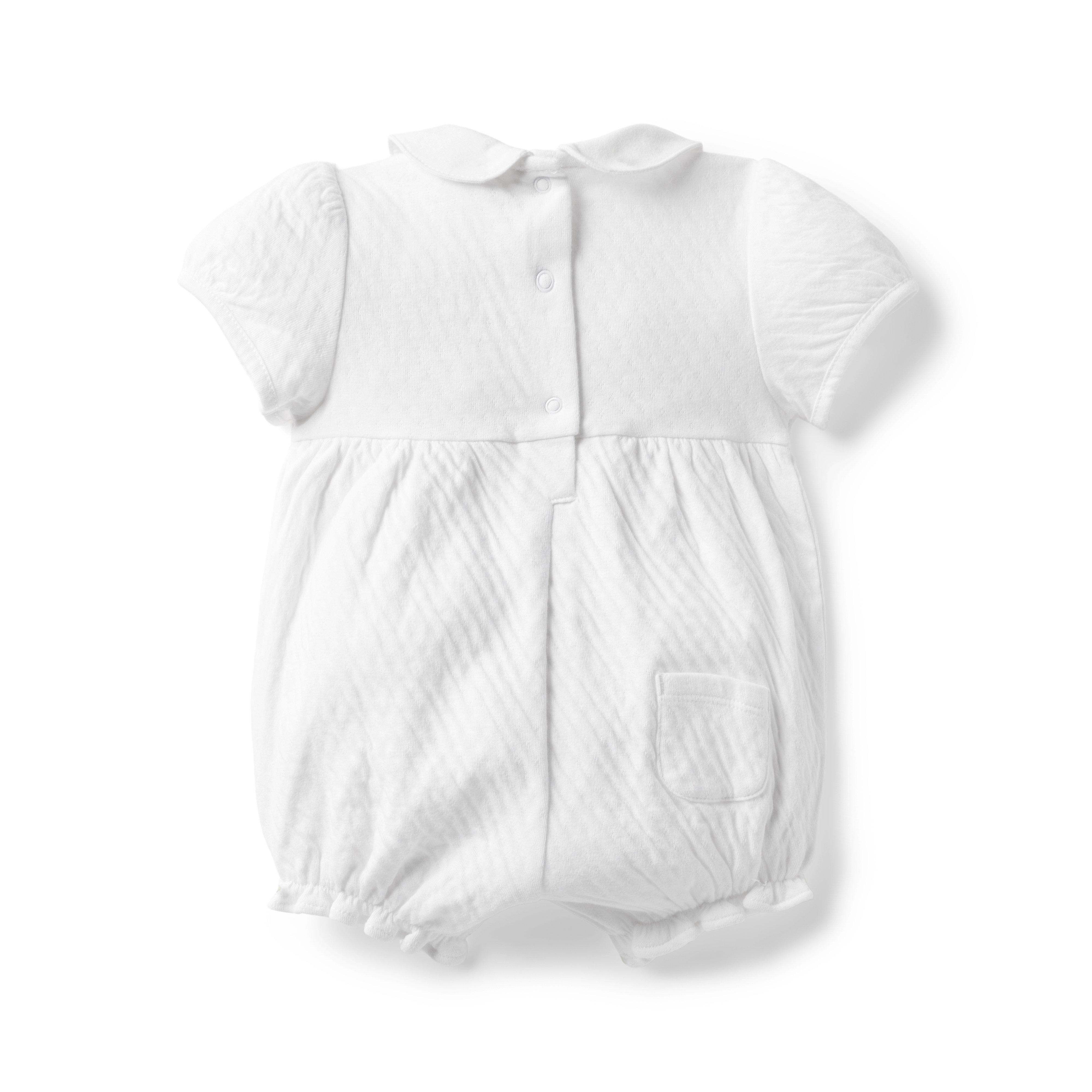 The Charlotte Pointelle Smocked Baby Romper image number 1