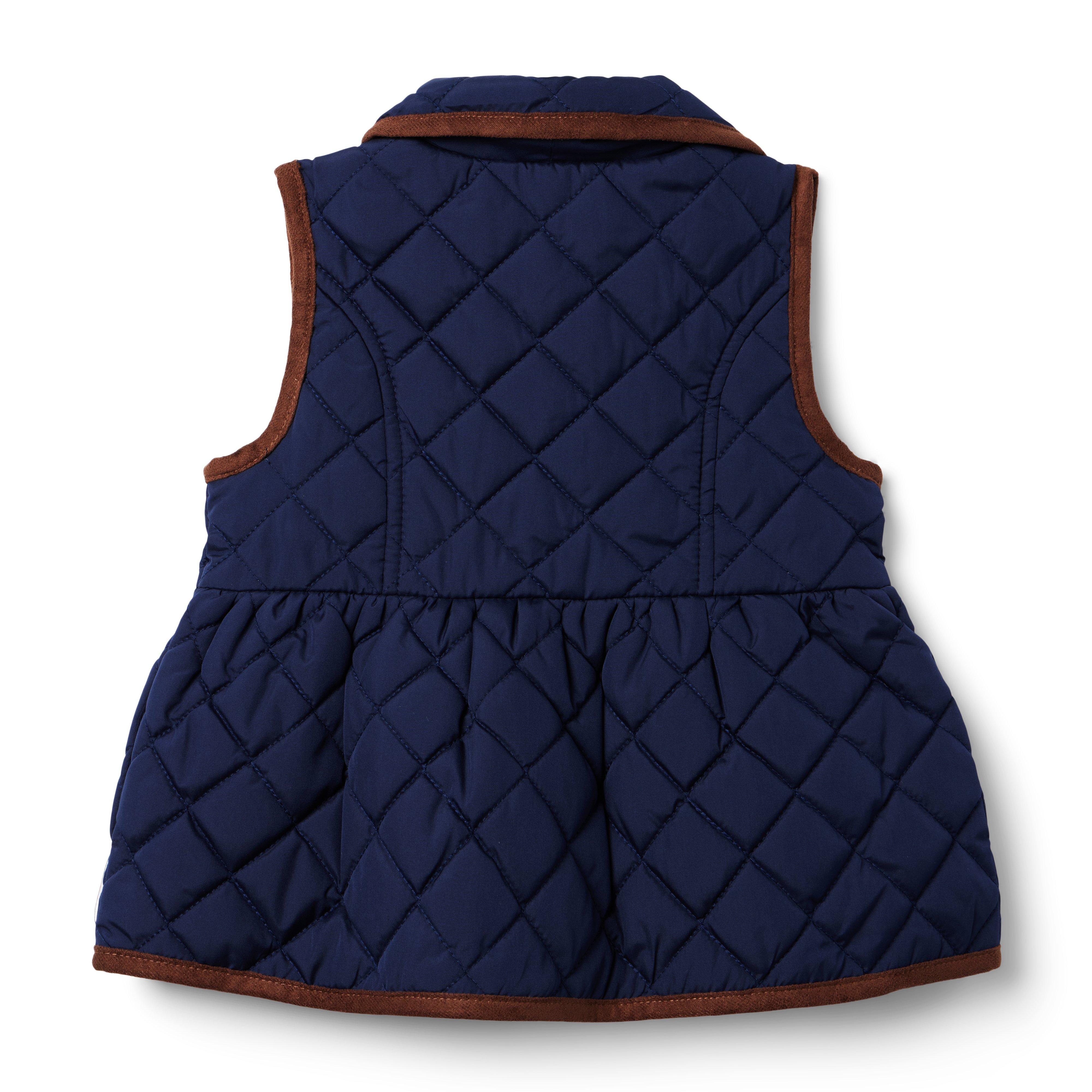 The Quilted Peplum Vest