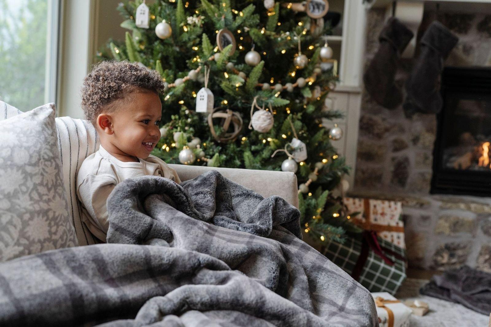 Grand Faux Fur Throw Blanket in Truffle Plaid