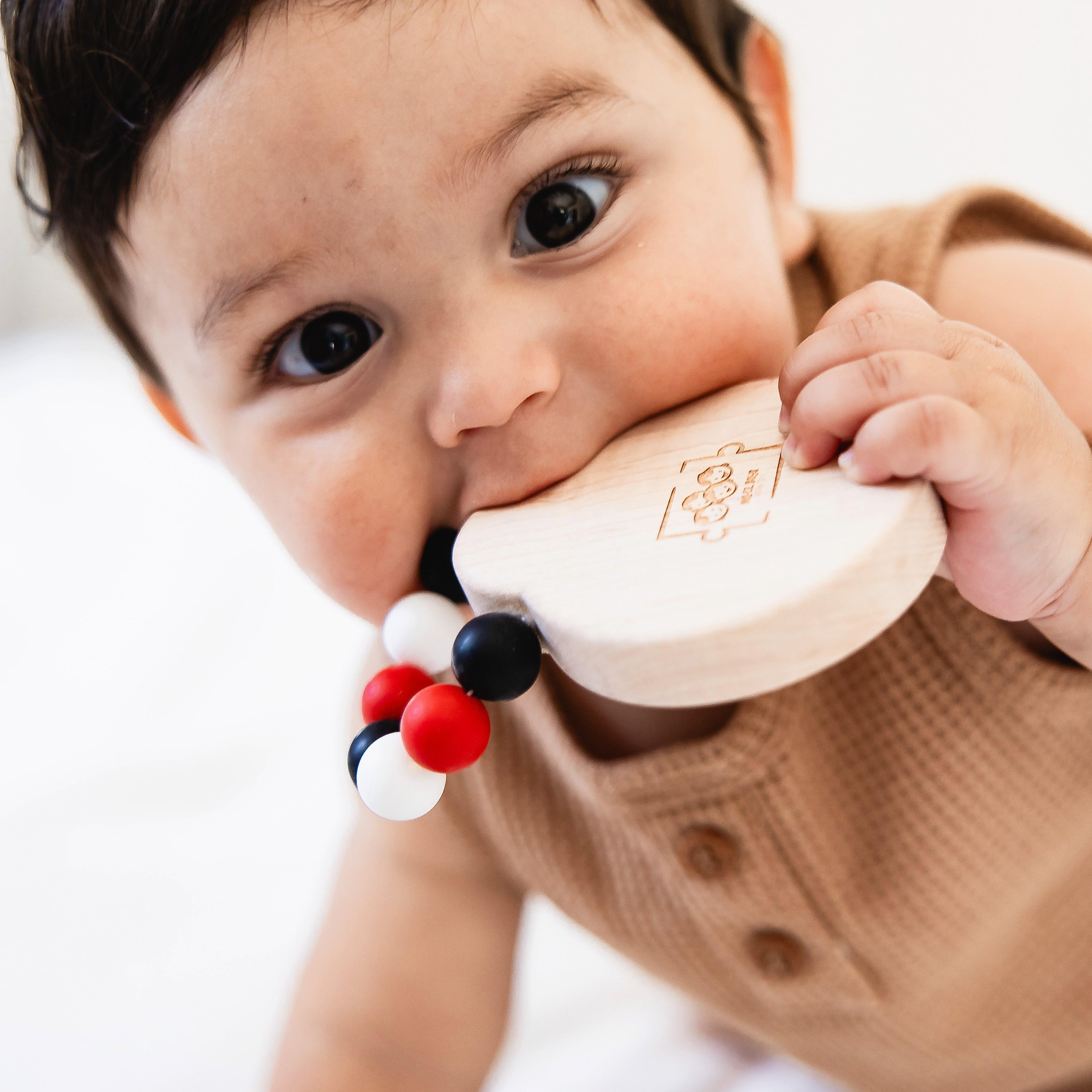 Silicone Bead Teether with Organic Cotton Bag - Ladybug image number 1