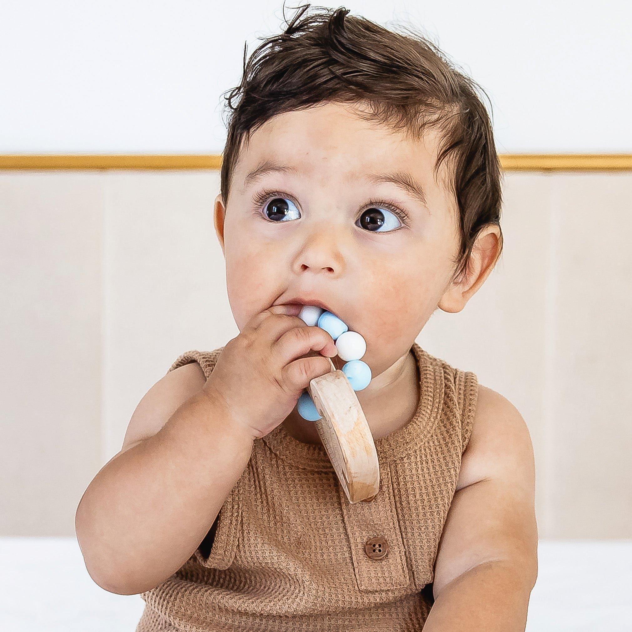 Silicone Bead Teether with Organic Cotton Bag - Heart with Blue Beads image number 1