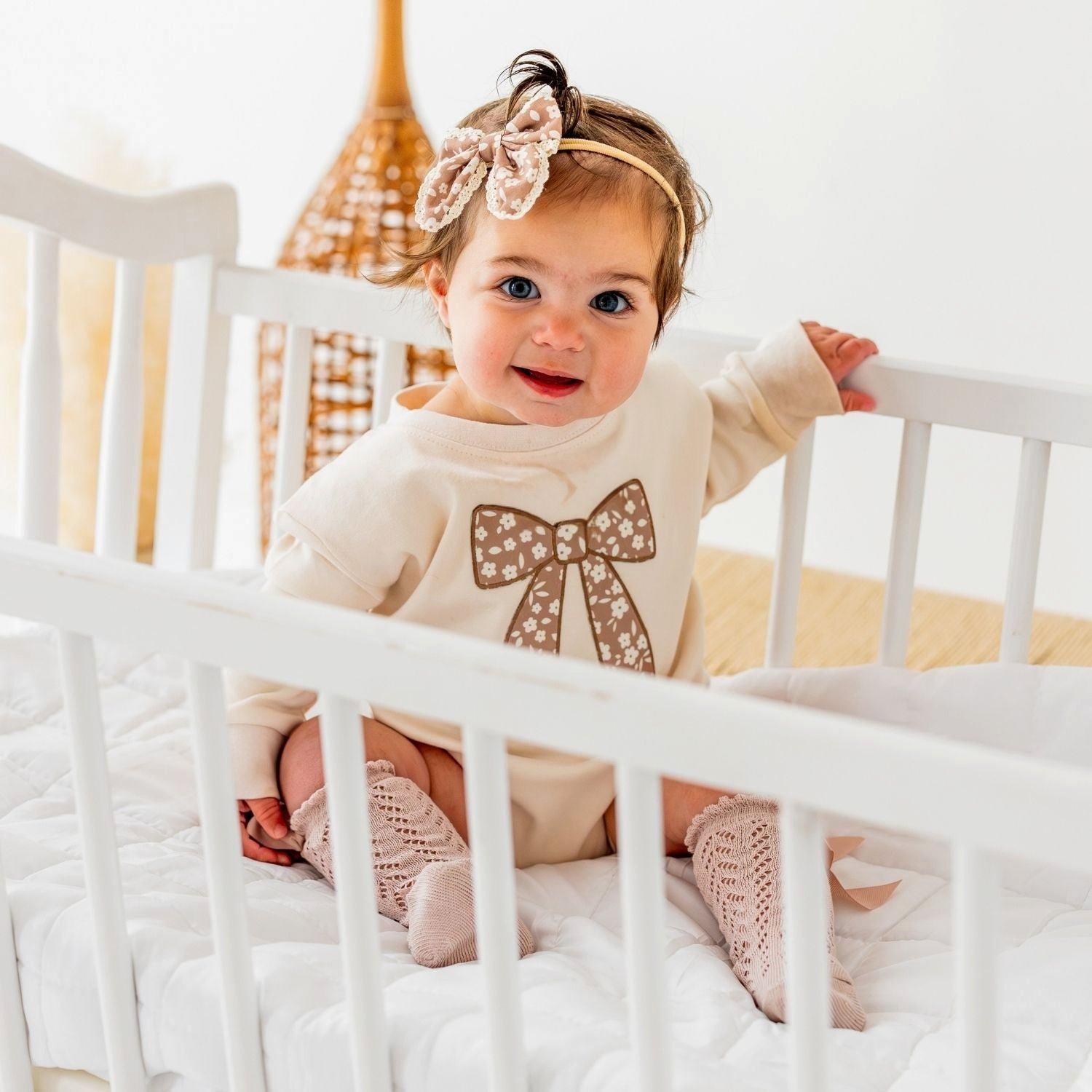 Mocha Floral Bow Patch Long Sleeve Romper image number 1