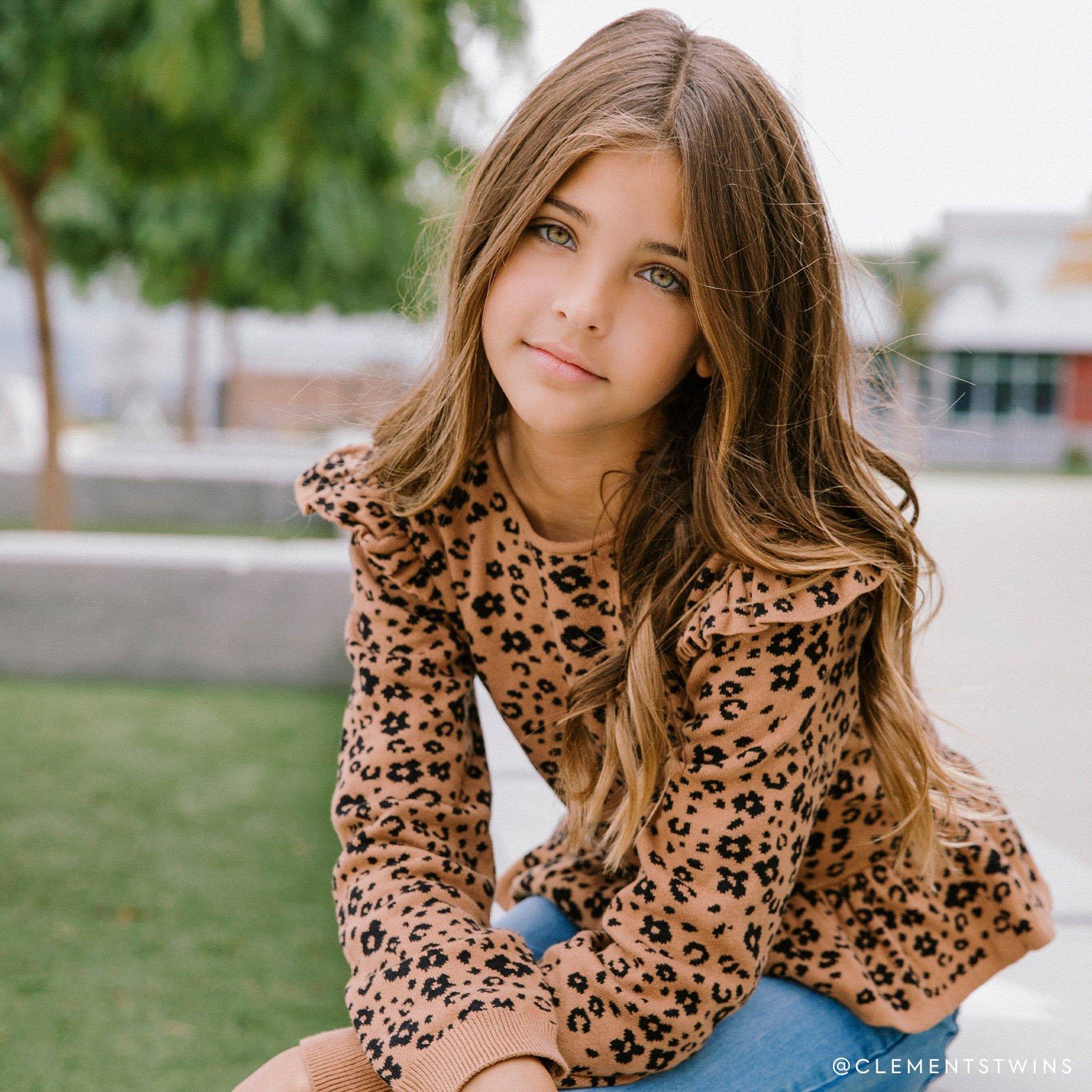 Leopard Peplum Sweater image number 1
