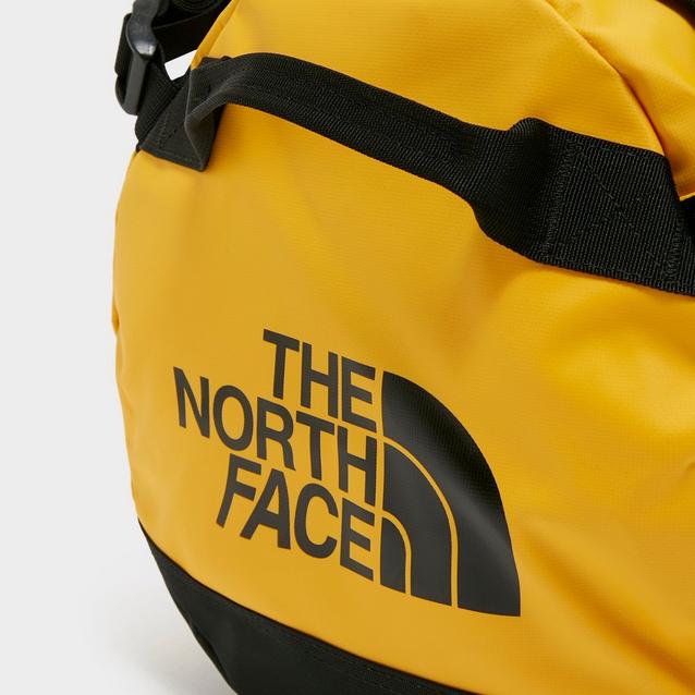 North face duffel on sale bag small yellow