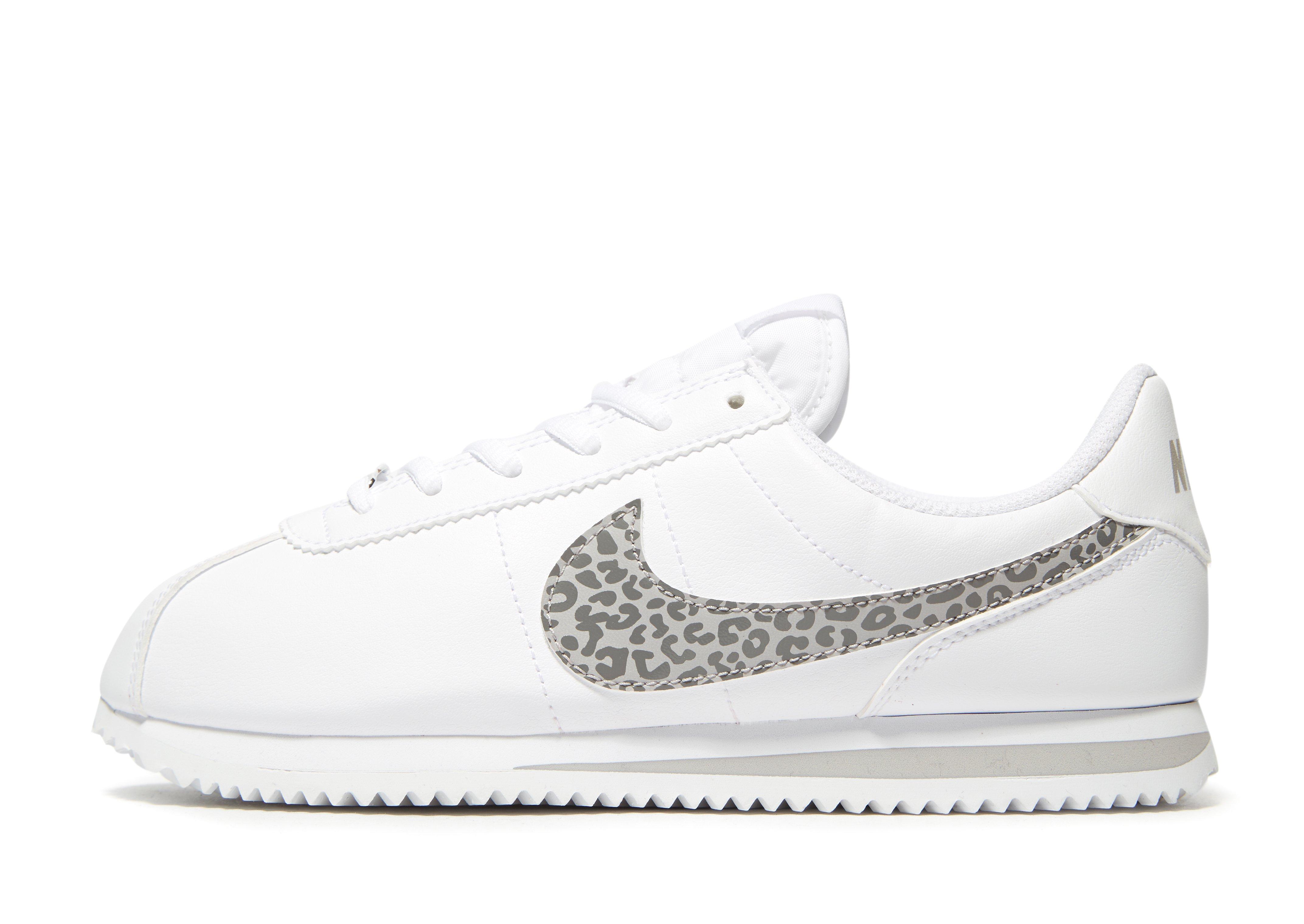 white nike cortez junior