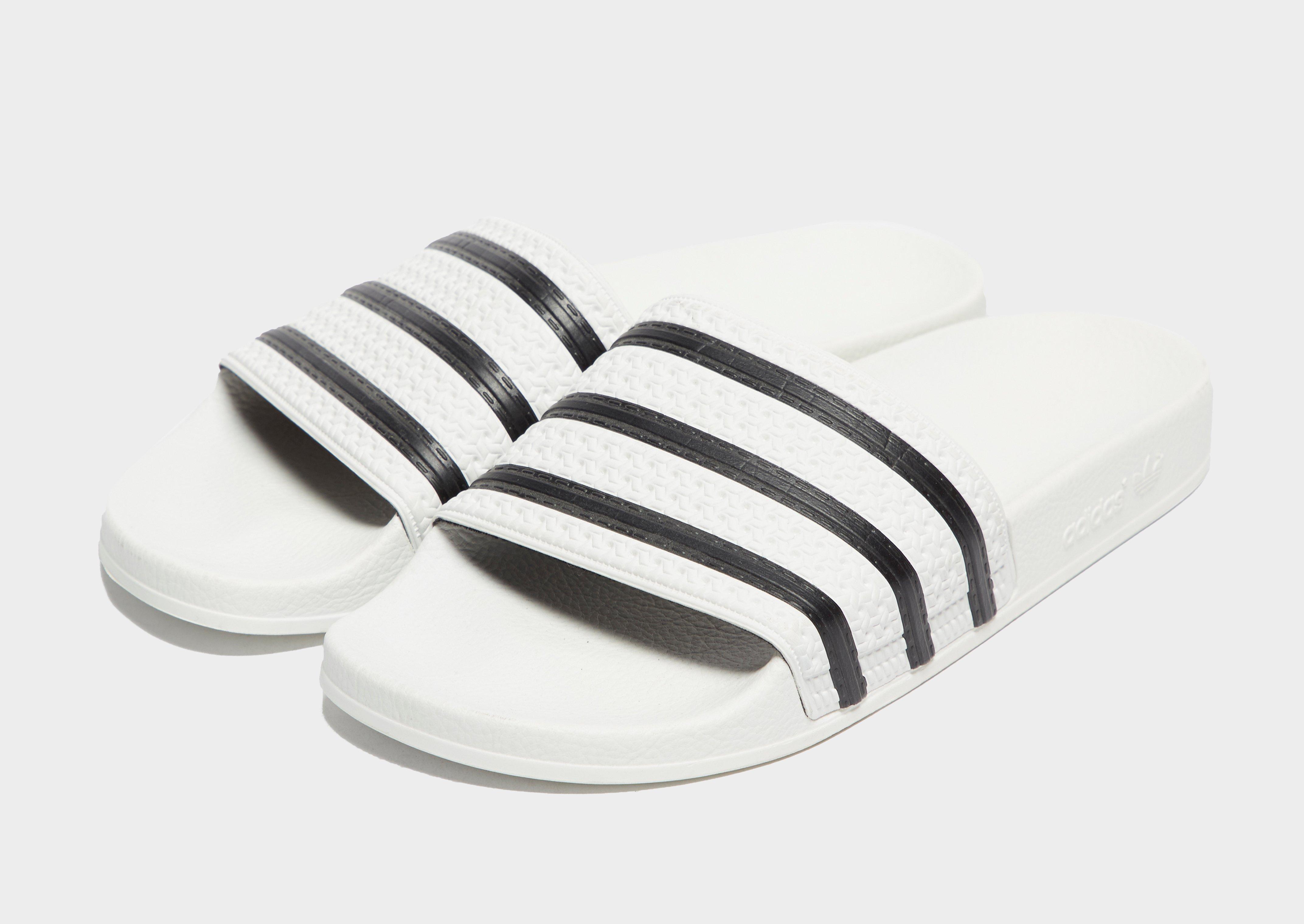 Férfi papucsok és flip-flopok ADIDAS ADILETTE  280648 Fehér