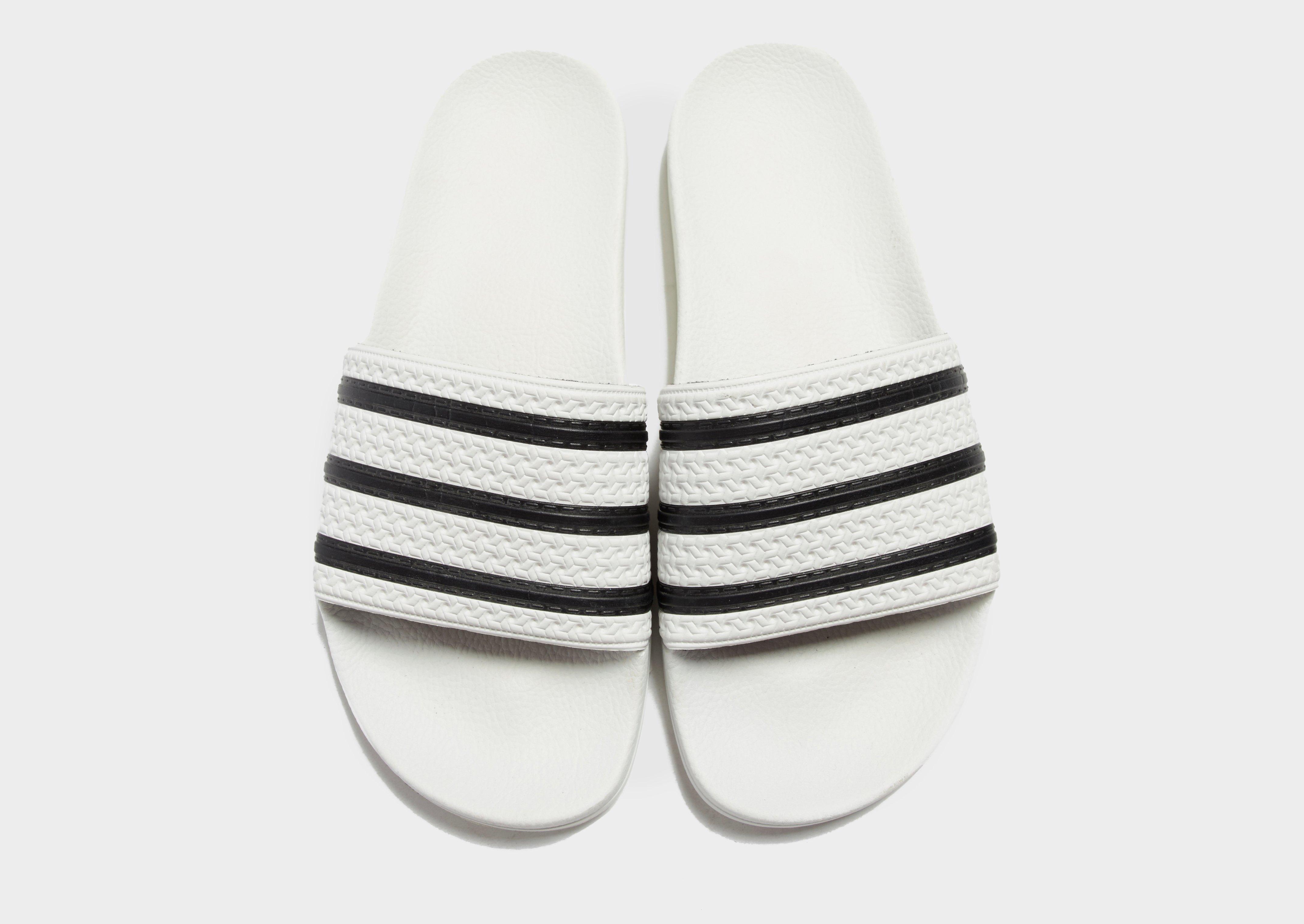 Férfi papucsok és flip-flopok ADIDAS ADILETTE  280648 Fehér