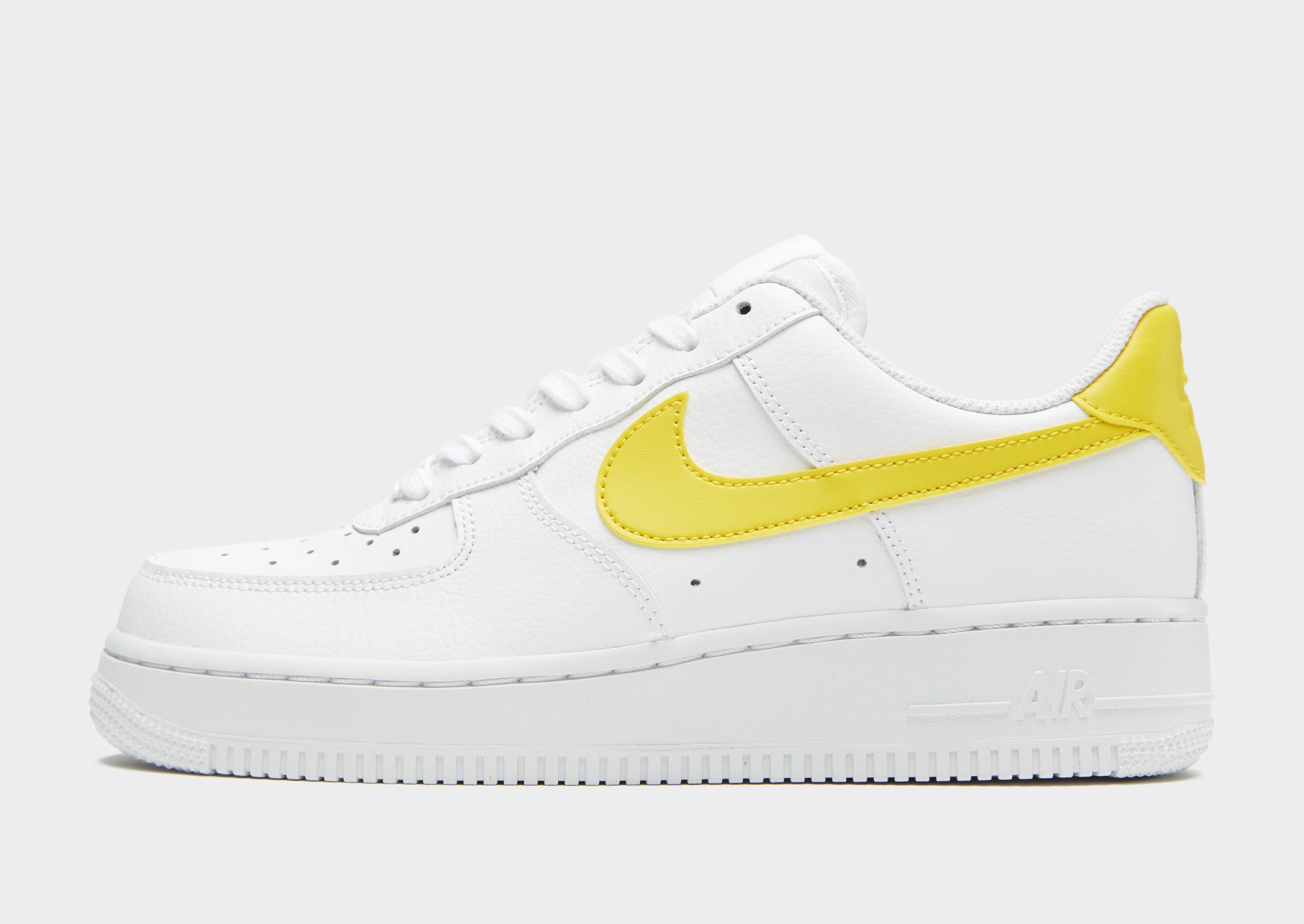 nike air force white with yellow tick