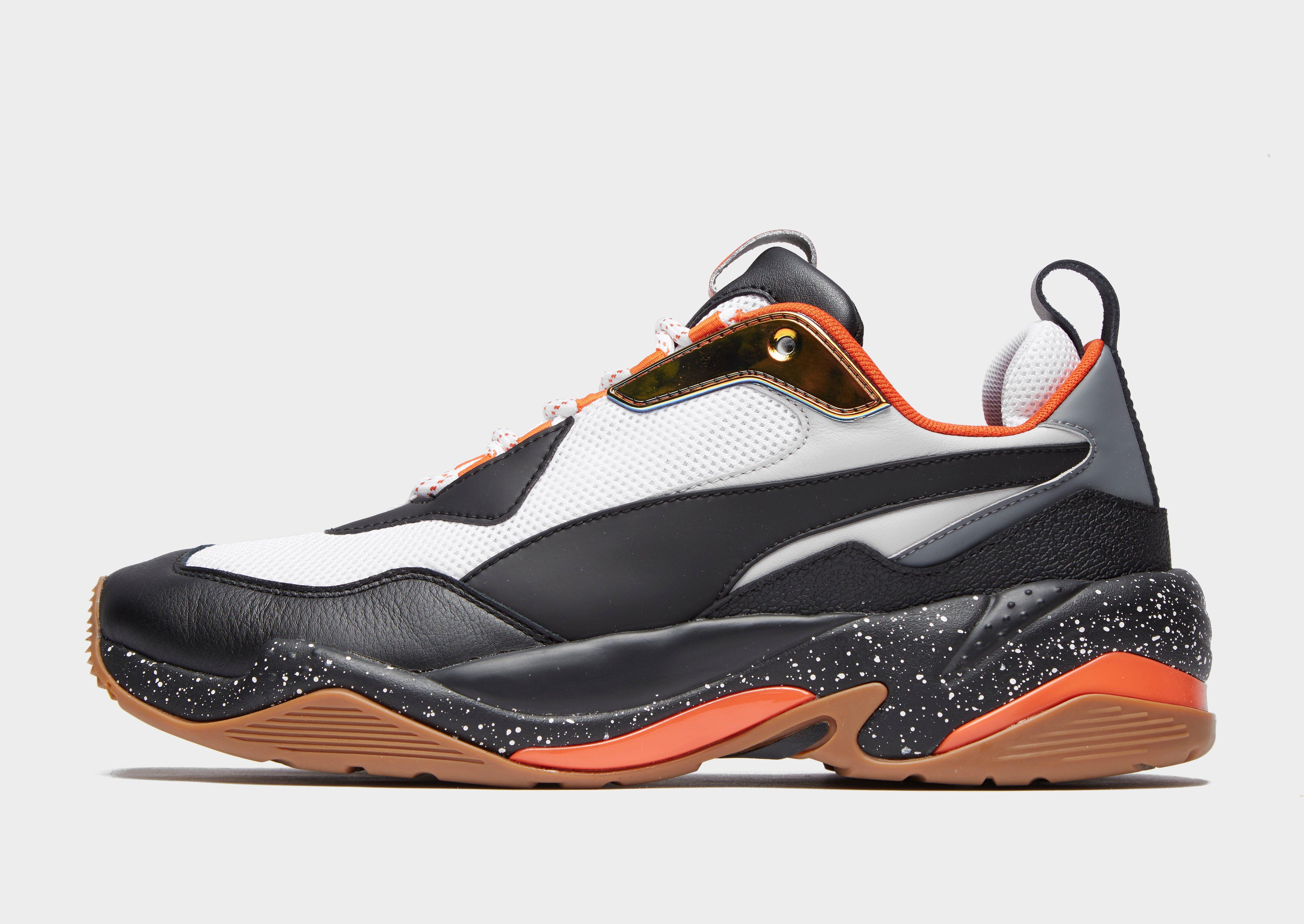 JD exclusive PUMA Thunder electric til mænd i sort, hvid og orange