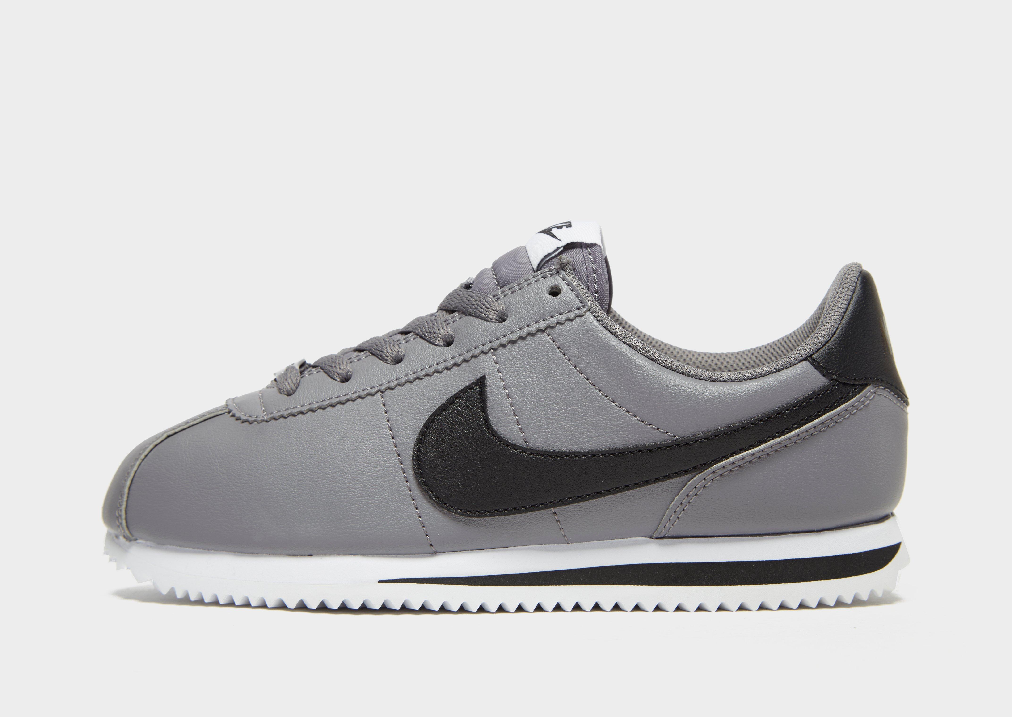 black nike cortez junior