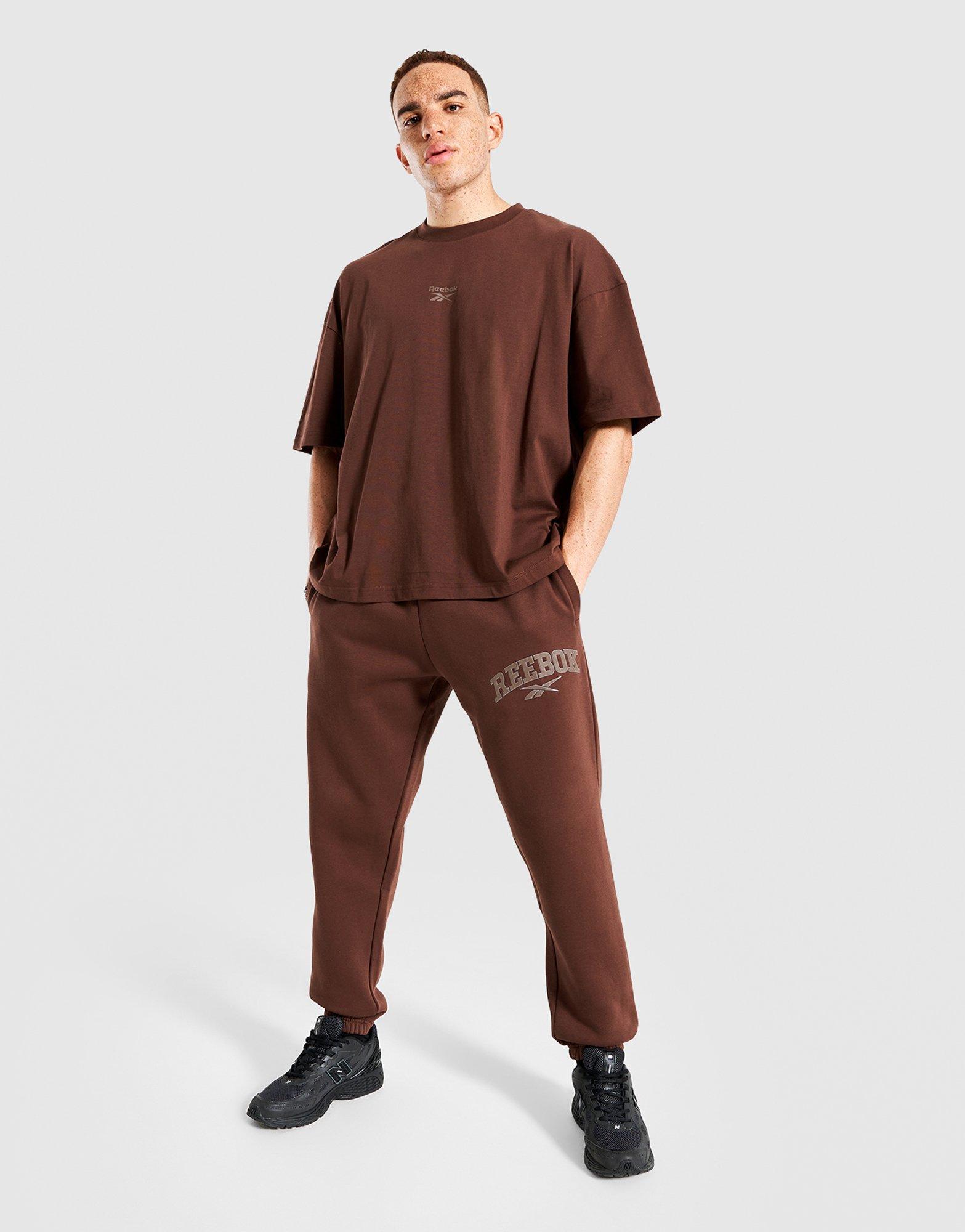 Мъжки панталони REEBOK ПАНТАЛОНИ PHILLIP VARSITY 100241203 Кафяв