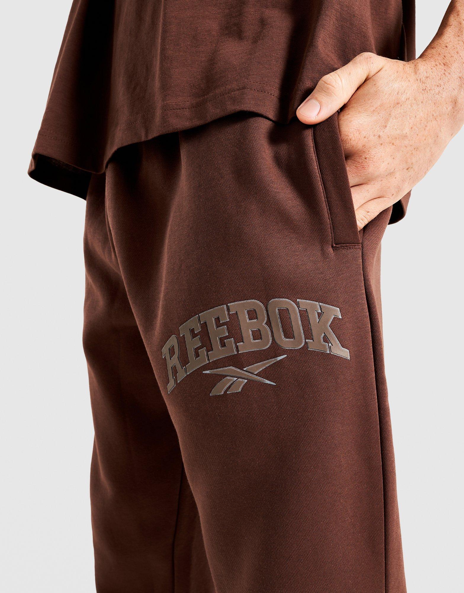 Мъжки панталони REEBOK ПАНТАЛОНИ PHILLIP VARSITY 100241203 Кафяв