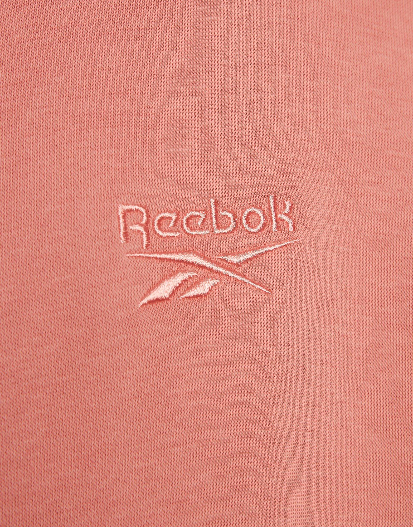 Moteriškas džemperis REEBOK DŽEMPERIS SU GOBTUVU   WARDROBE ESSENTIALS CROP 100253819 Rožinė