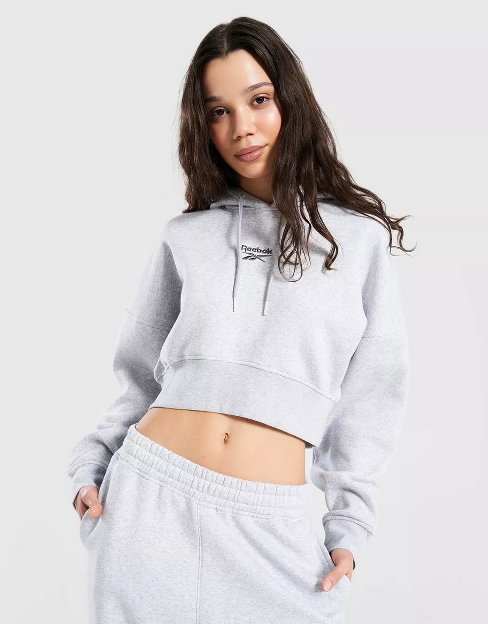 REEBOK КОФТА З КАПЮШОНОМ WARDROBE ESSENTIALS CROP, фото 1 з 4