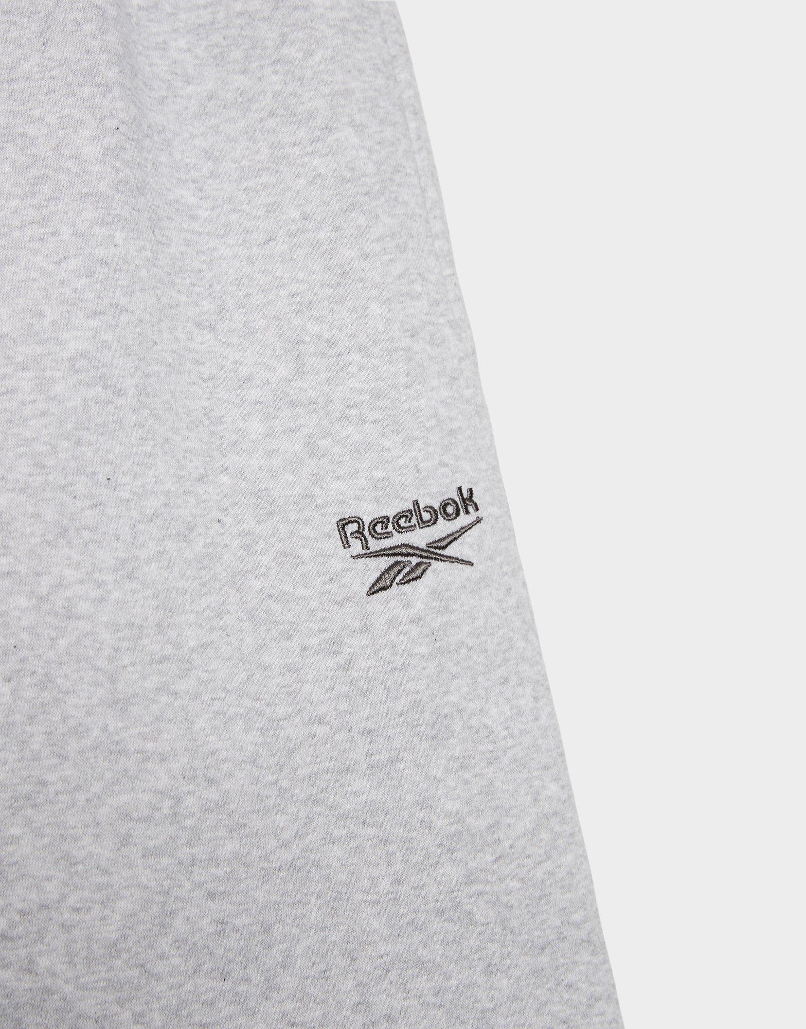 Moteriškos kelnės REEBOK KELNĖS WARDROBE ESSENTIALS SWEATPANT 100253825 Pilka