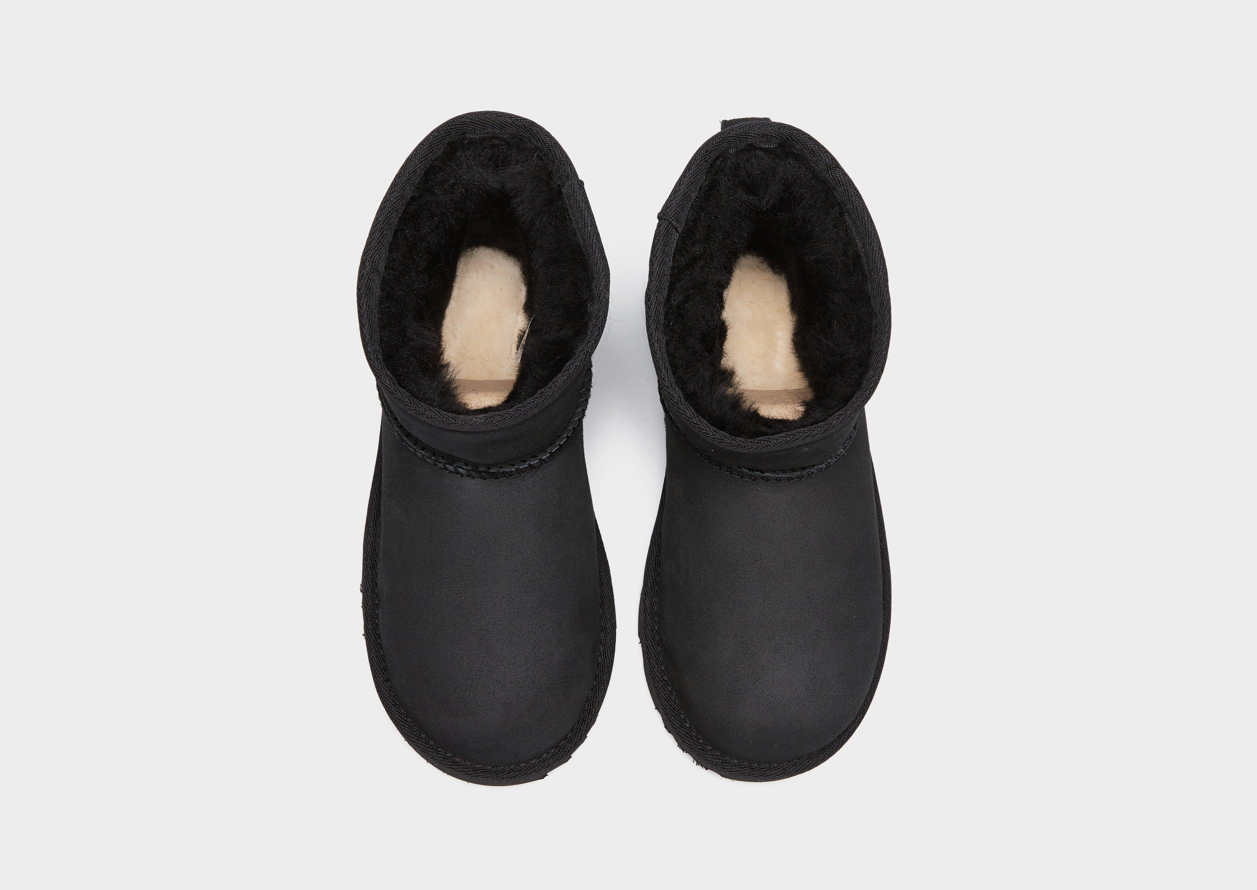 Dječje zimske čizme UGG CLASSIC MINI II 1017715K-BLK crna