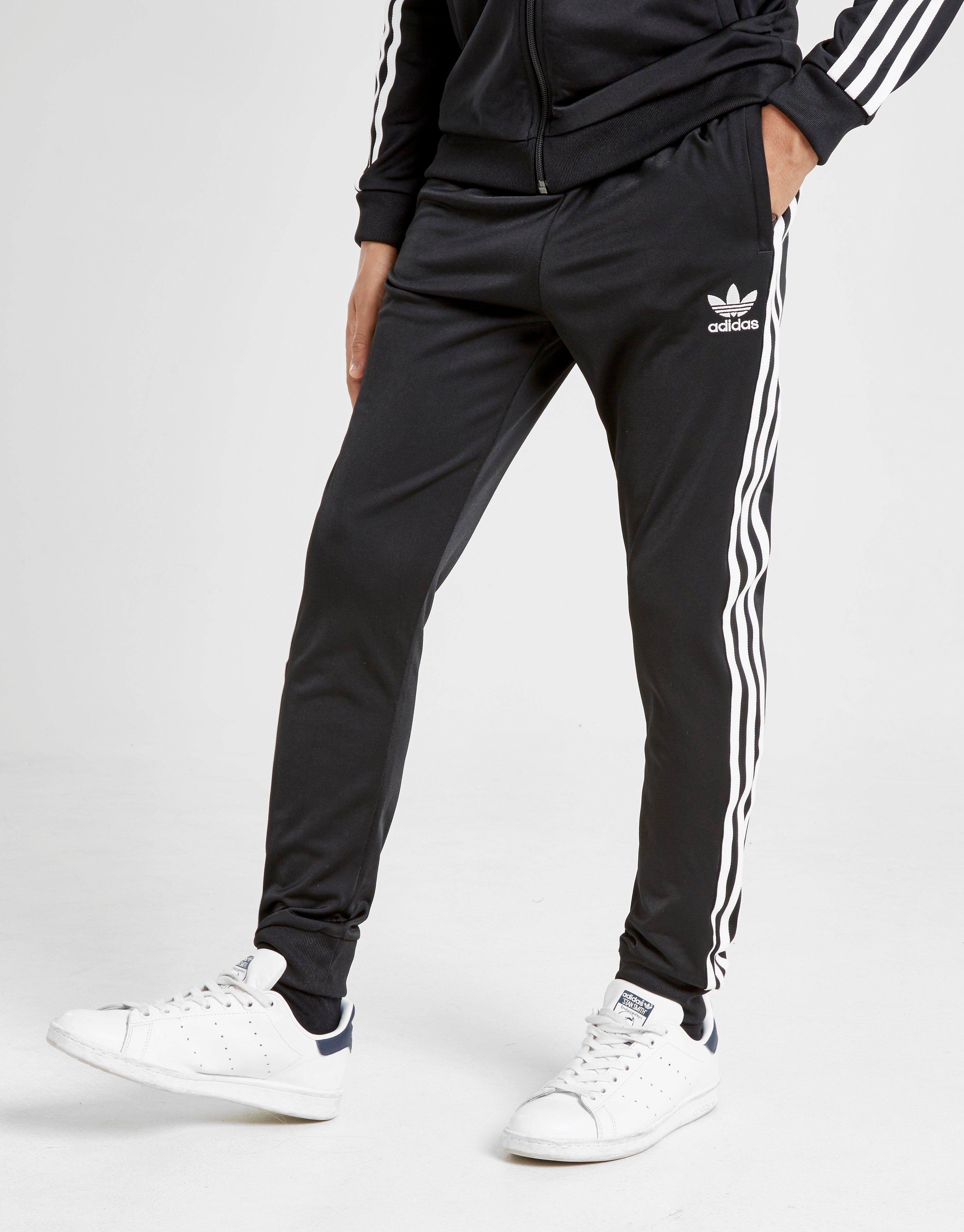 adidas Originals Nova Wind Joggers CARBONRAWSTE adidas Originals Nova Wind Joggers CARBONRAWSTE