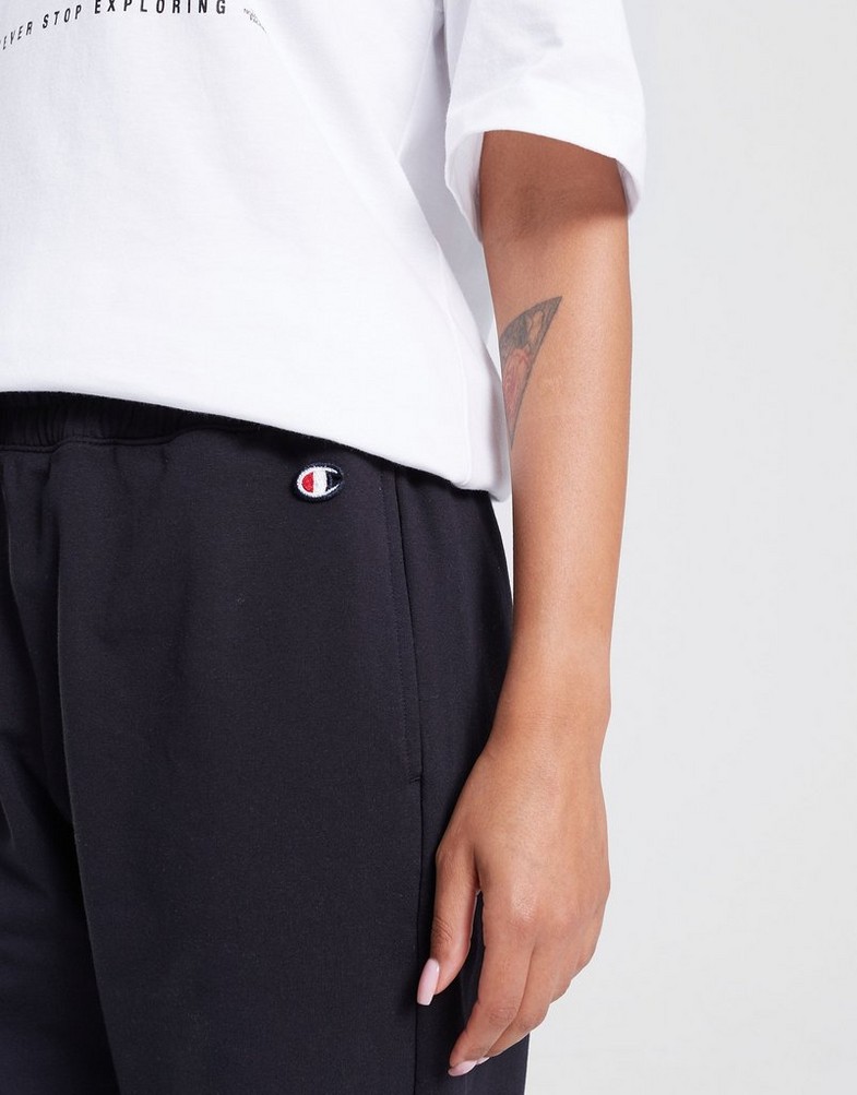 Dámské kalhoty CHAMPION KALHOTY  ELASTIC CUFF PANTS 116610KK001 Černá
