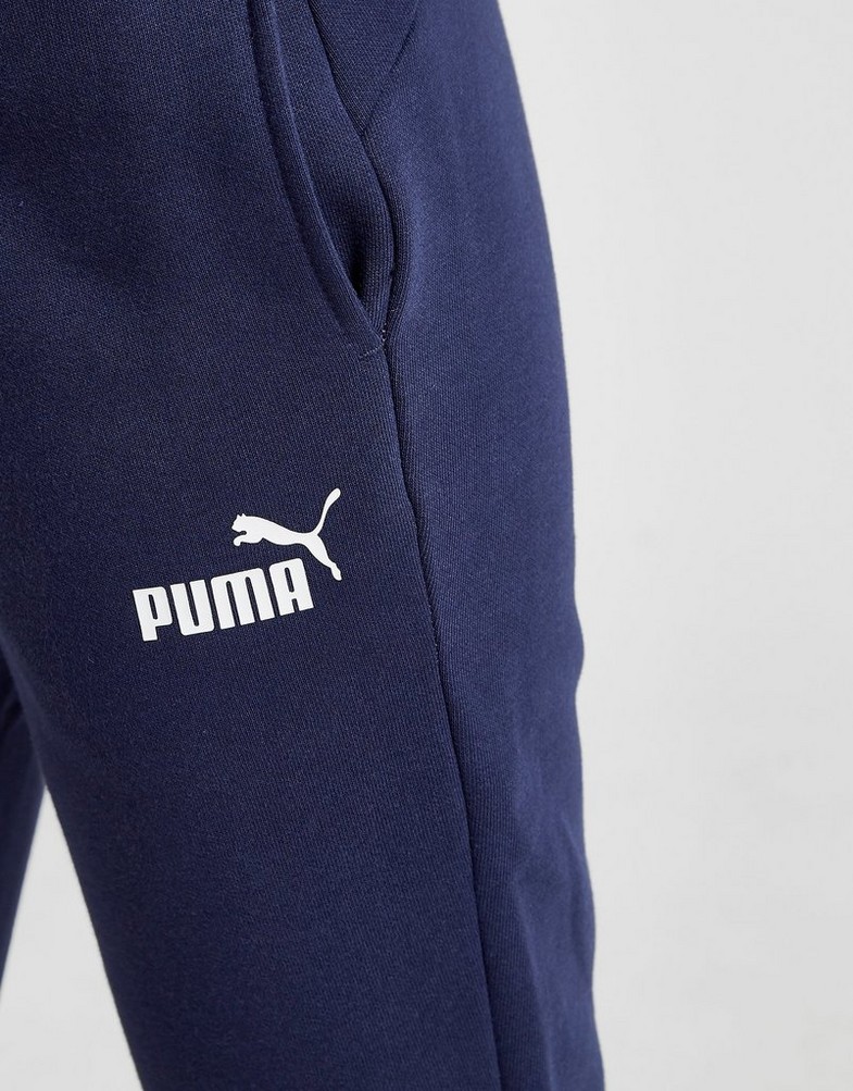 Dámske nohavice PUMA NOHAVICE  CORE JOGGERS 58684106 Tmavomodrá