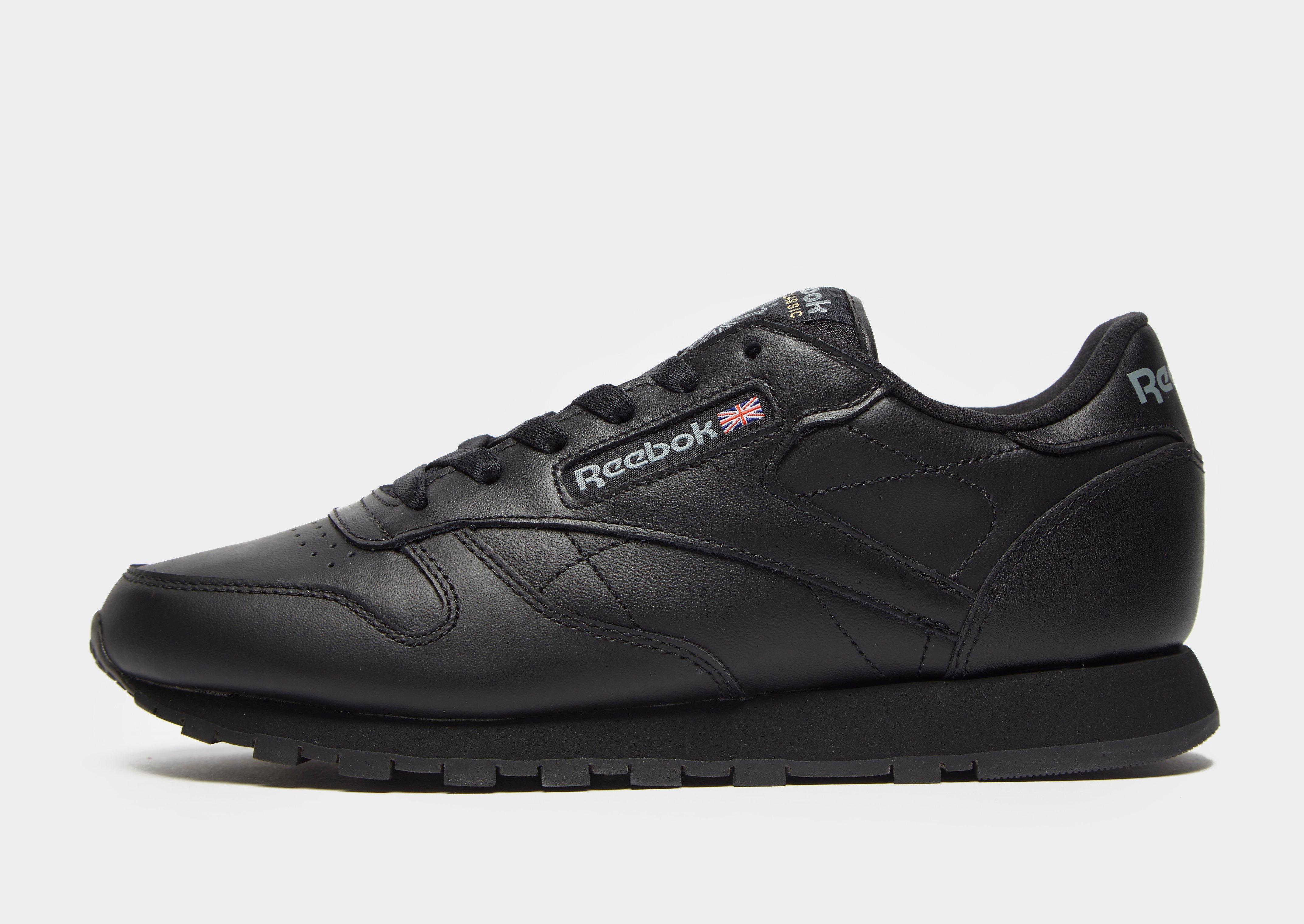 all black reebok shoes