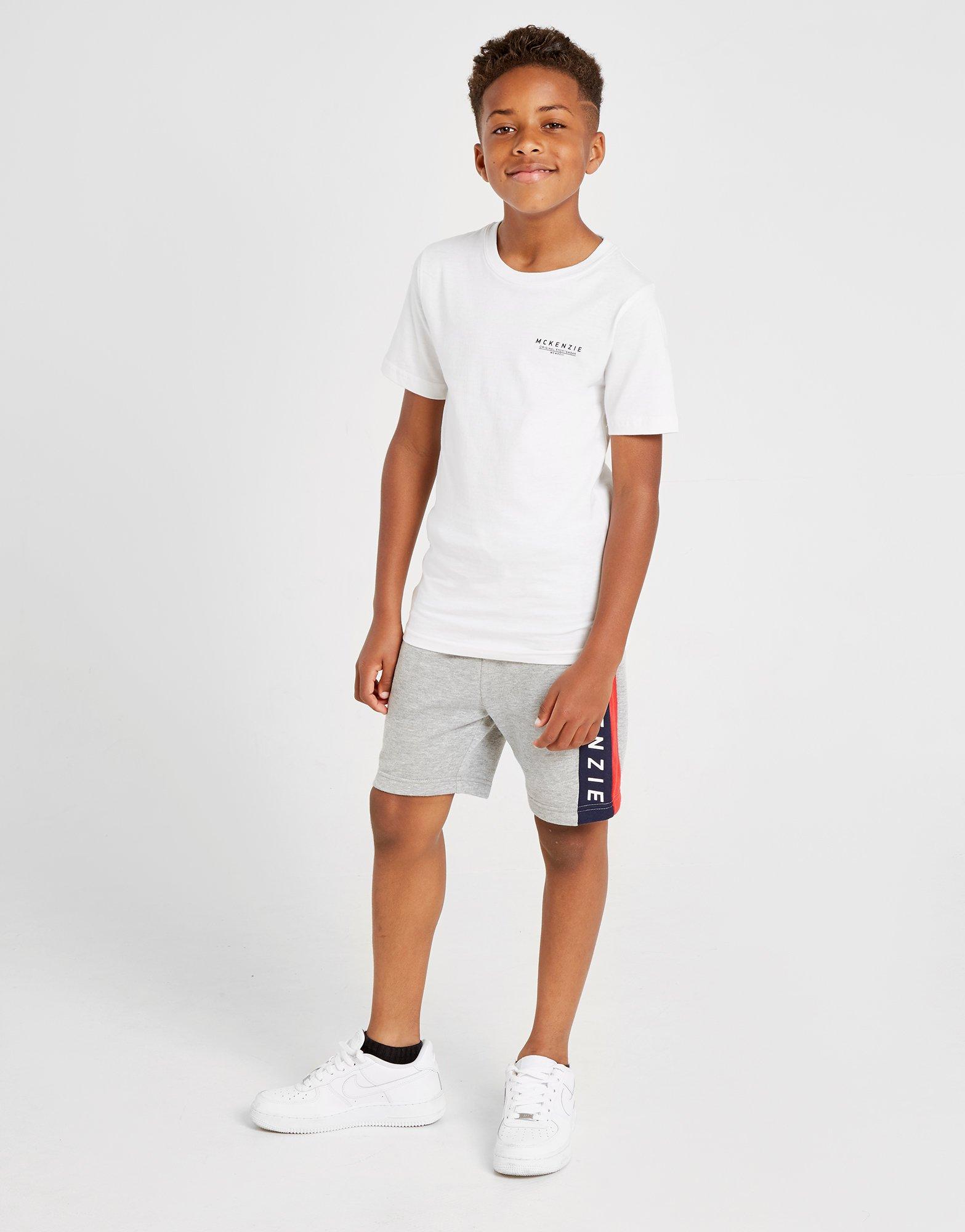 Детска тениска MCKENZIE ТЕНИСКА ESSENTIAL ТЕНИСКА JUNIOR MCKTJ13420 Бял